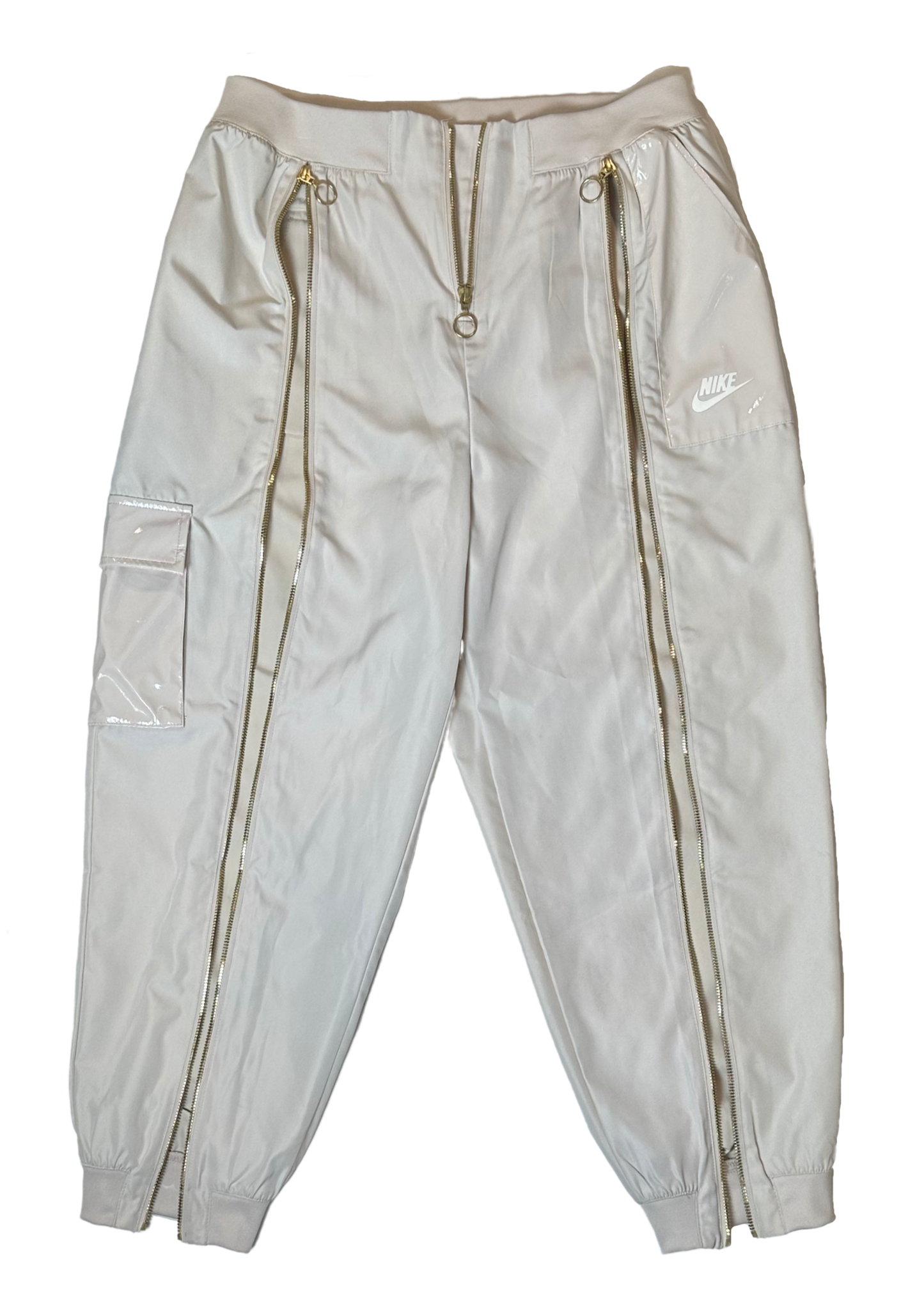 Nike Women's Nude Zip Front Cargo Joggers  Patent Leather Details sze M Effortless style meets functional cool with these cargo joggers that refuse to take themselv