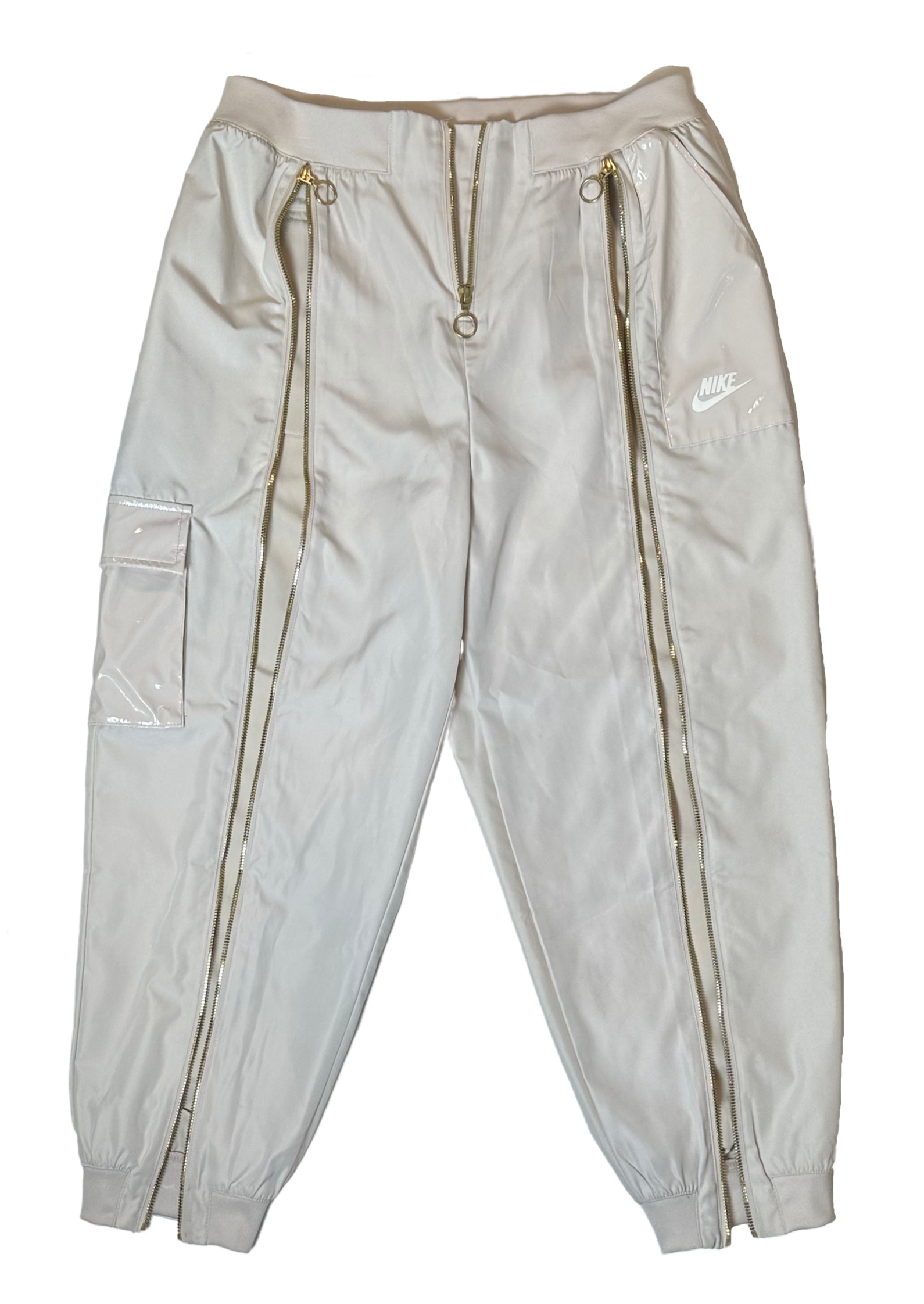 Nike Women's Nude Zip Front Cargo Joggers  Patent Leather Details sze M Effortless style meets functional cool with these cargo joggers that refuse to take themselv