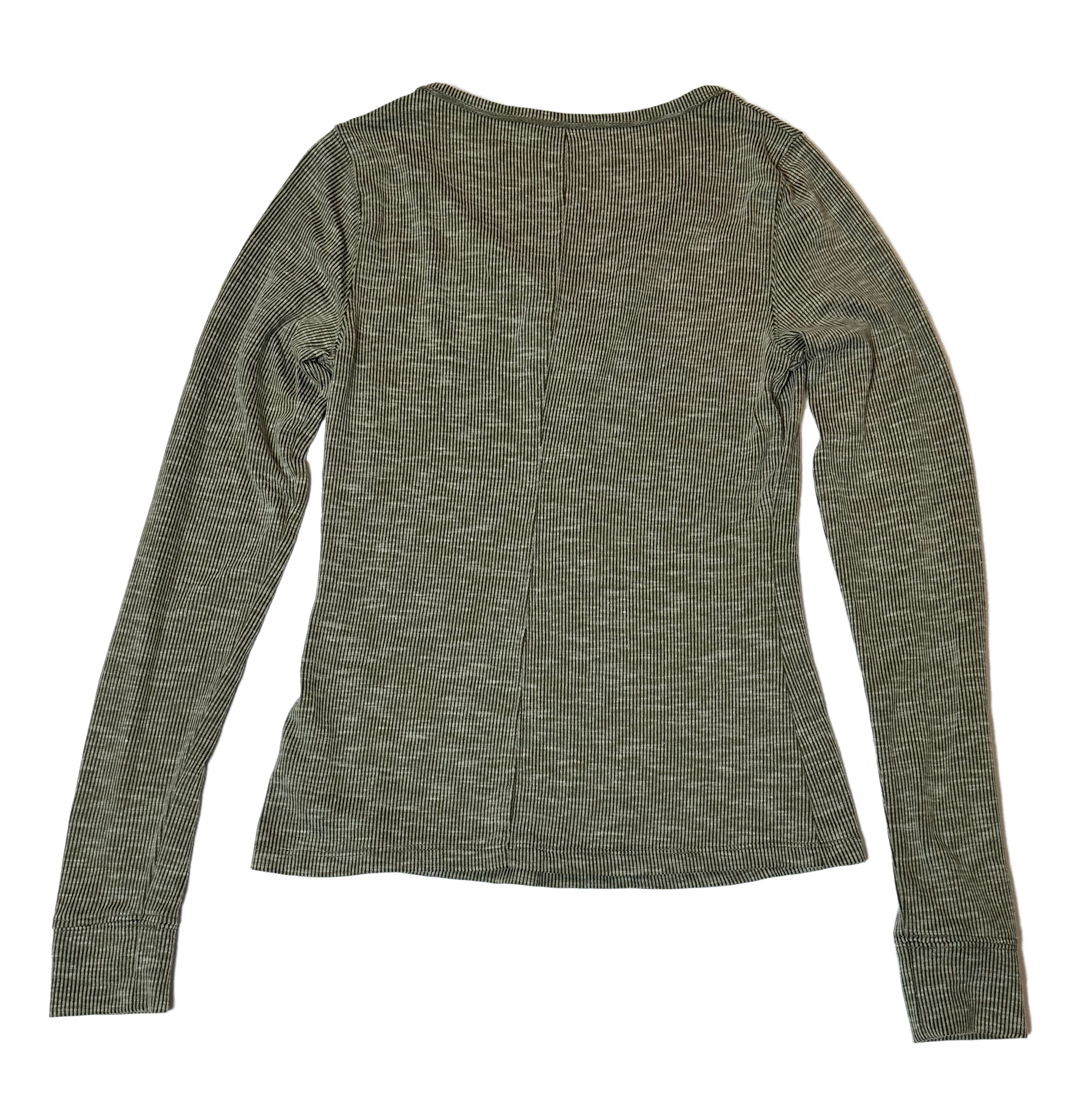 Universal ThreadsThis long-sleeve henley thermal from Universal Threads will keep you feeling cozy and looking cool! Crafted with a soft, moss-green fabric and classic henley style, TopUniversal Threads Moss Green Long Sleeve Henley ThermalUniversal Threads Moss Green Long Sleeve Henley Thermal