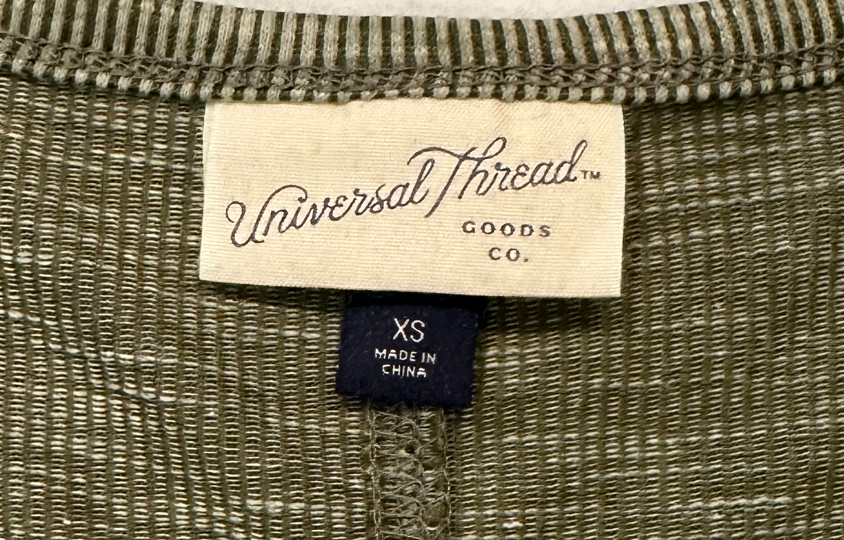 Universal ThreadsThis long-sleeve henley thermal from Universal Threads will keep you feeling cozy and looking cool! Crafted with a soft, moss-green fabric and classic henley style, TopUniversal Threads Moss Green Long Sleeve Henley ThermalUniversal Threads Moss Green Long Sleeve Henley Thermal