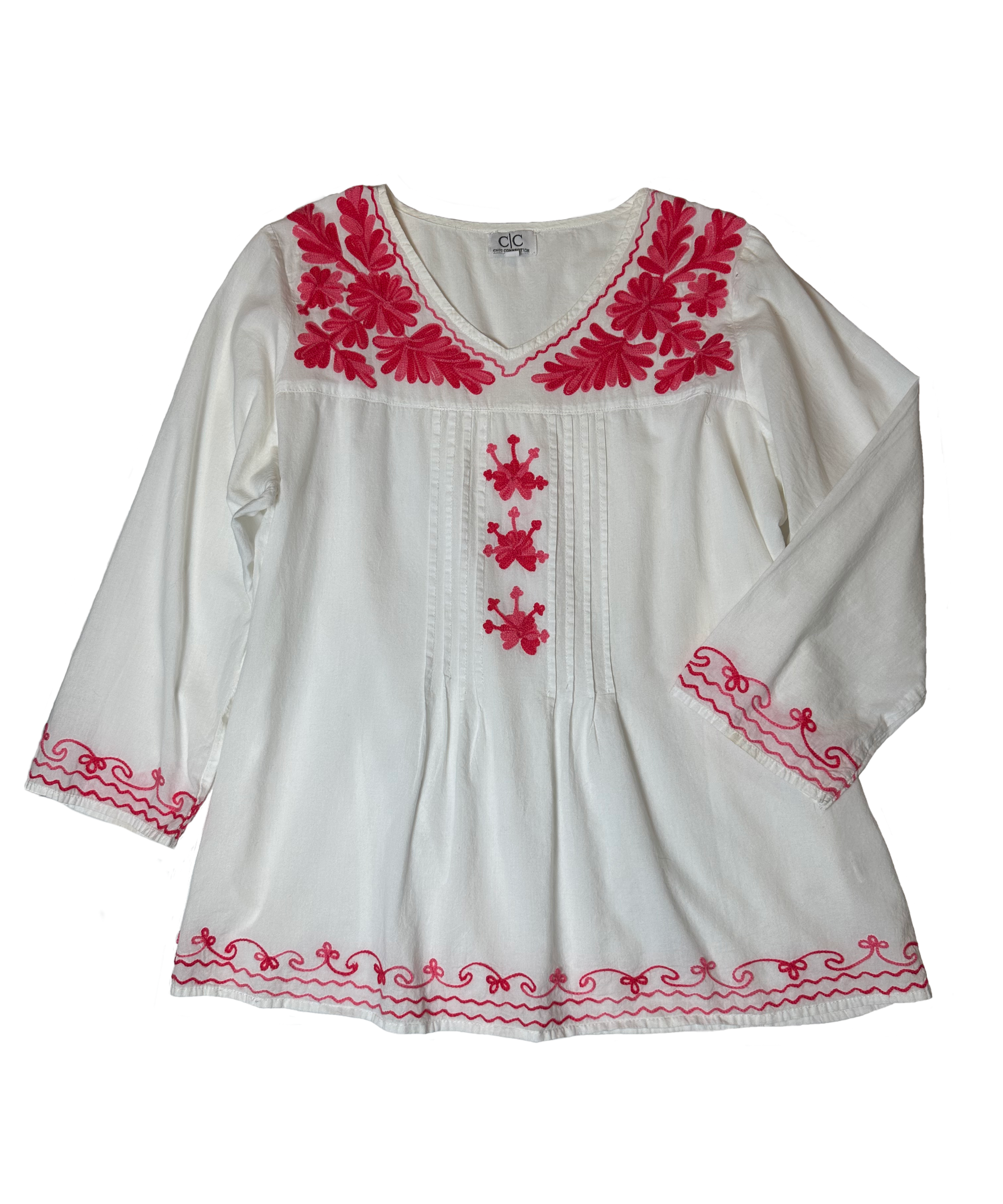 CC Chic Connections White Peasant Blouse with Pink Embroidery Look chic and stylish in this fun, flirty CC Chic Connections white peasant blouse with pink embroidery. Crafted from breathable cotton, its 3/4 sleeves and hot pinkShirtCC Chic Connections White Peasant Blouse with Pink EmbroideryCC Chic Connections White Peasant Blouse