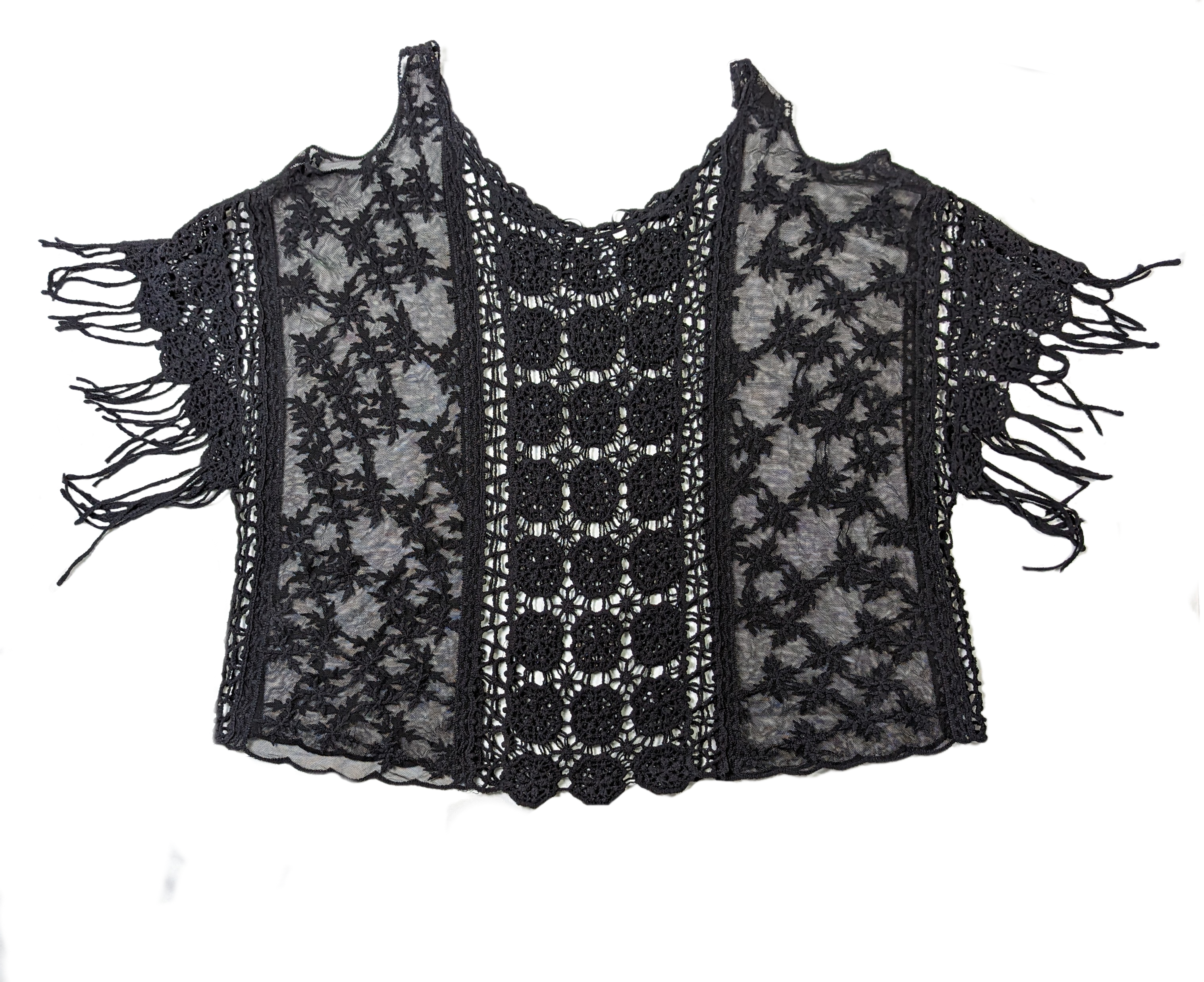 Mudd Black Crochet Top with Fringe Let your inner bohemian goddess shine in this Mudd Crochet Top! Combining the perfect touch of edge and sophistication, this black crochet top features fringe for a TopsMudd Crochet TopMudd Crochet Top