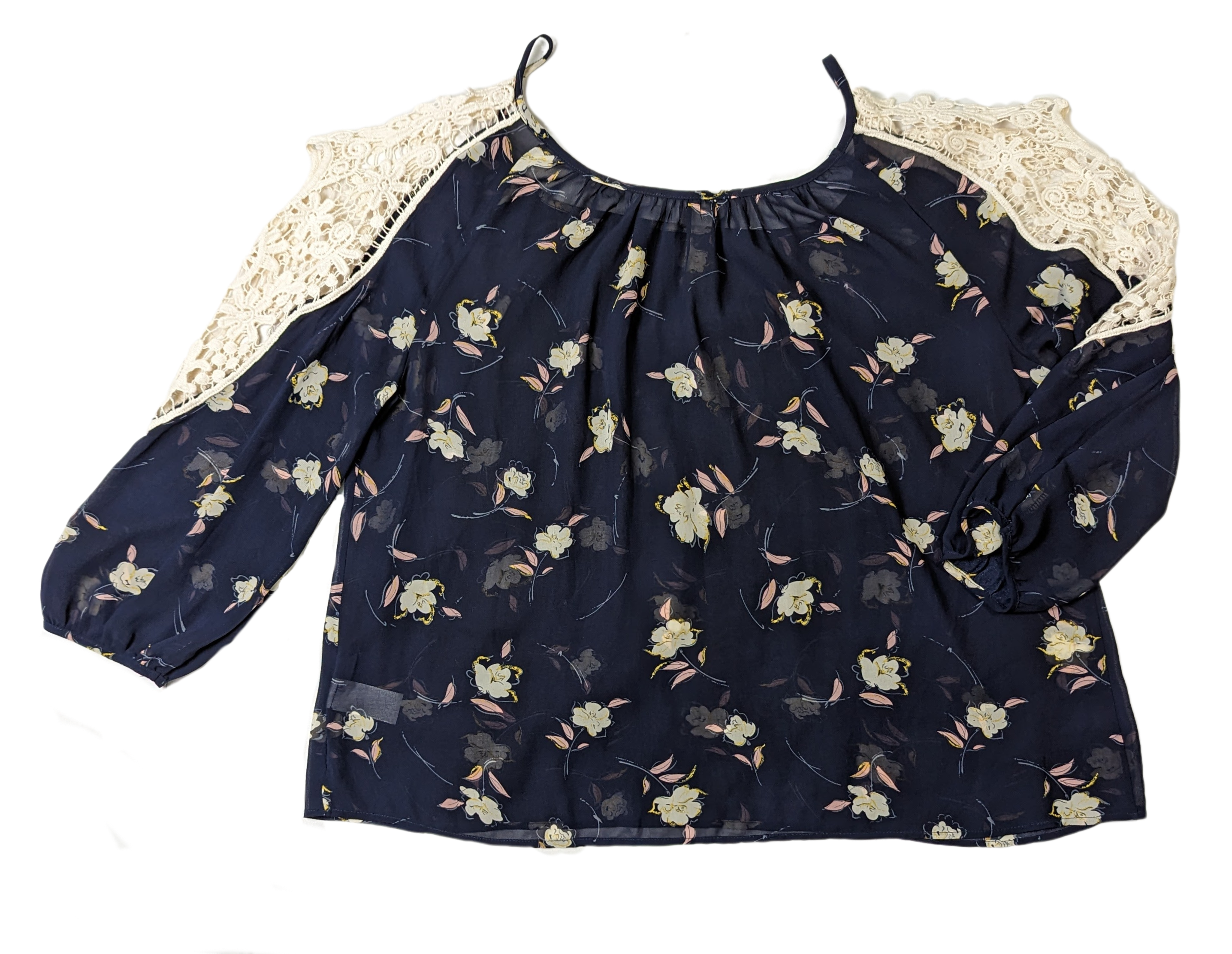 SopranoLive your life in full bloom with this captivating, navy floral blouse. Its cold-shoulder, crochet lace, and sheer fabric give a glam girly feel that's perfect for wShirts & TopsSoprano Cold Shoulder Floral BlouseSoprano Cold Shoulder Floral Blouse