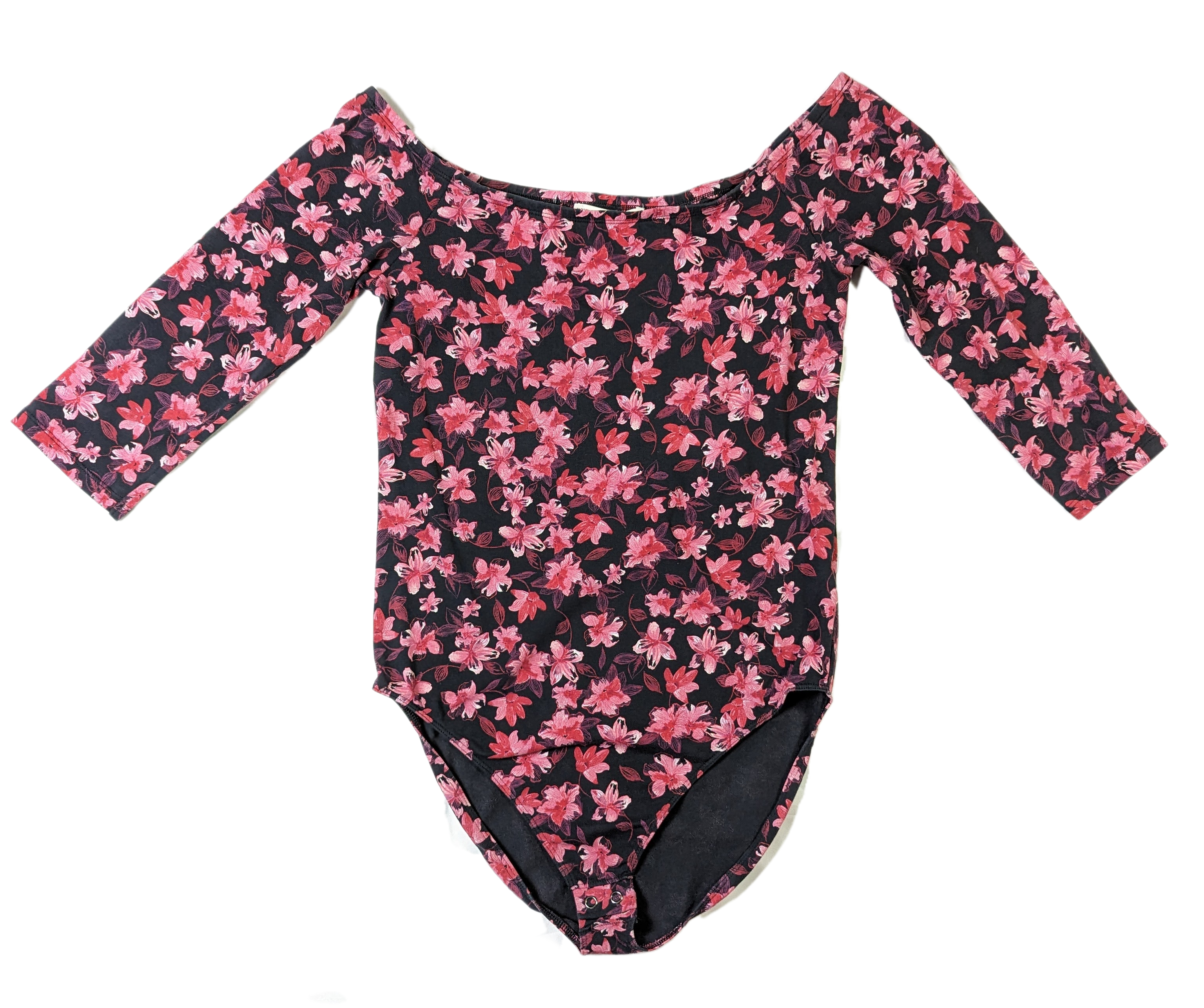 ExpressOur Express One Eleven Floral Bodysuit, made of a Cotton/Spandex blend, features a beautiful floral print on a black background with a 3/4 sleeve, off shoulder styleBodysuitExpress One Eleven Floral BodysuitEleven Floral Bodysuit