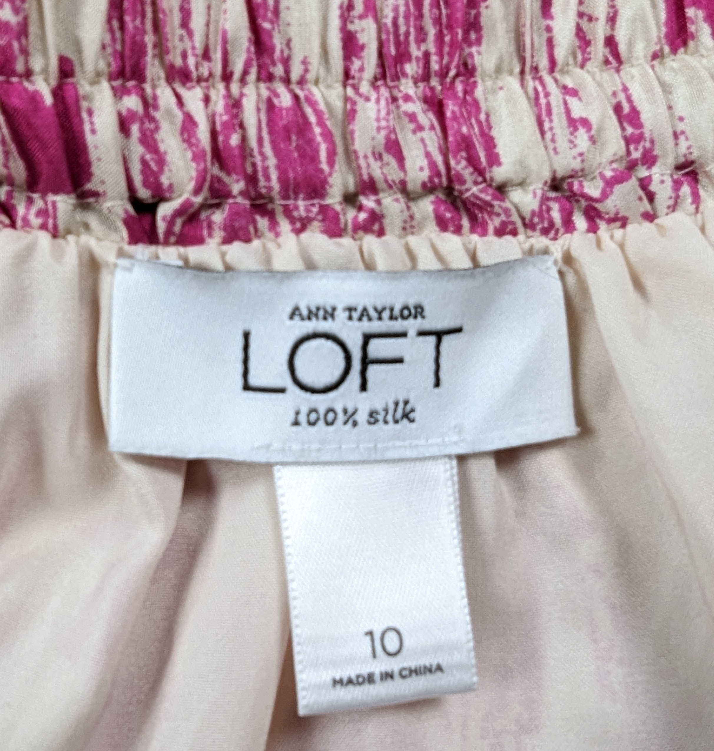 Ann Taylor Loft Silk Maxi Sundress with criss-cross straps and vibrant is a picture perfect piece! Soft ivory silk is adorned with a vivid magenta print, while the strapped criss cross back and olive green tDressesLoft Silk Maxi SundressLoft Silk Maxi Sundress