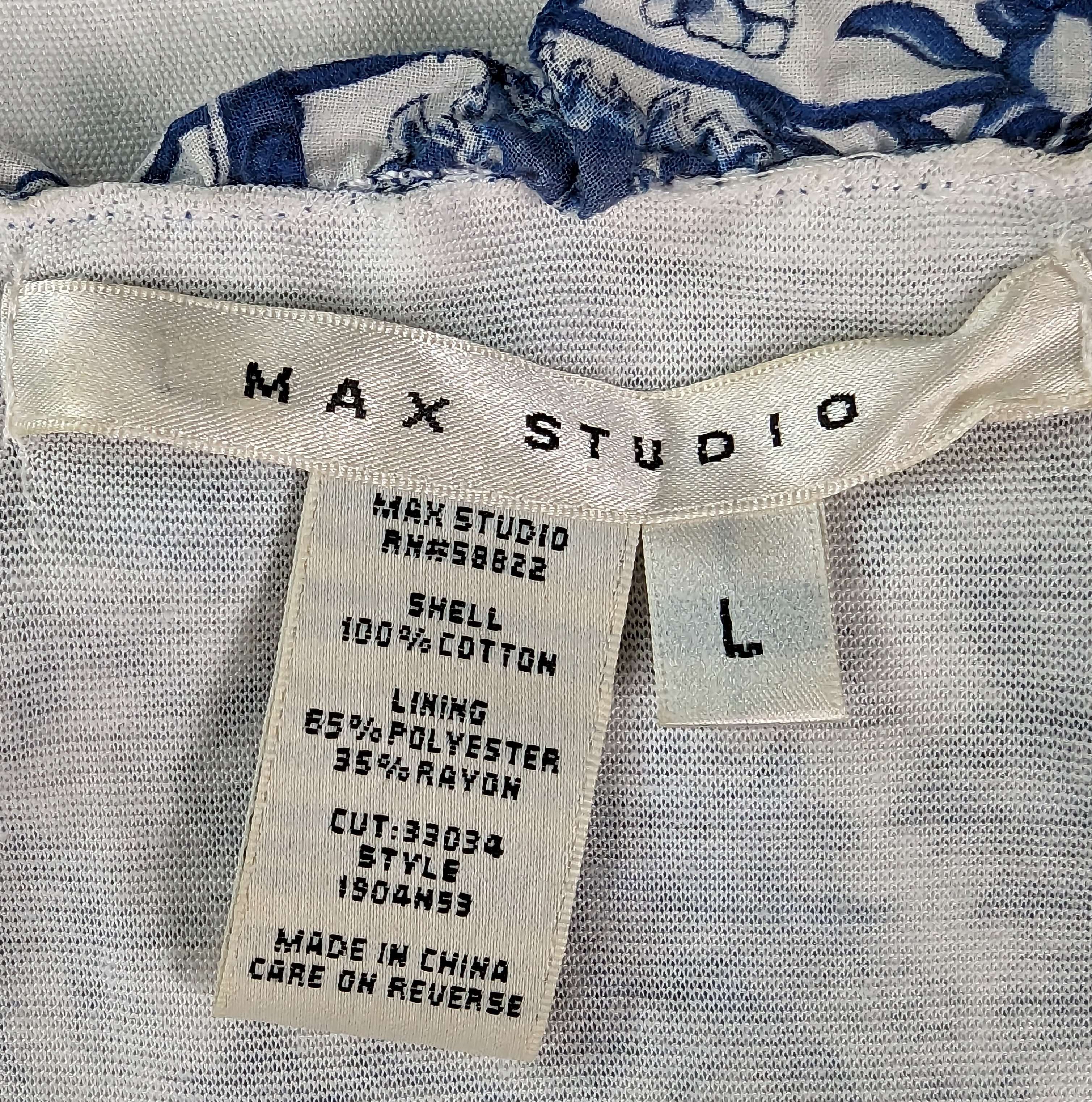 Max Studio Blue & White Sleeveless Dress Ruffle at neck and a beautiful print make this Max Studio dress a perfect choice for Spring!  Add a denim jacket or a light-weight sweater to create more interest!Max Studio Blue & White DressDresses