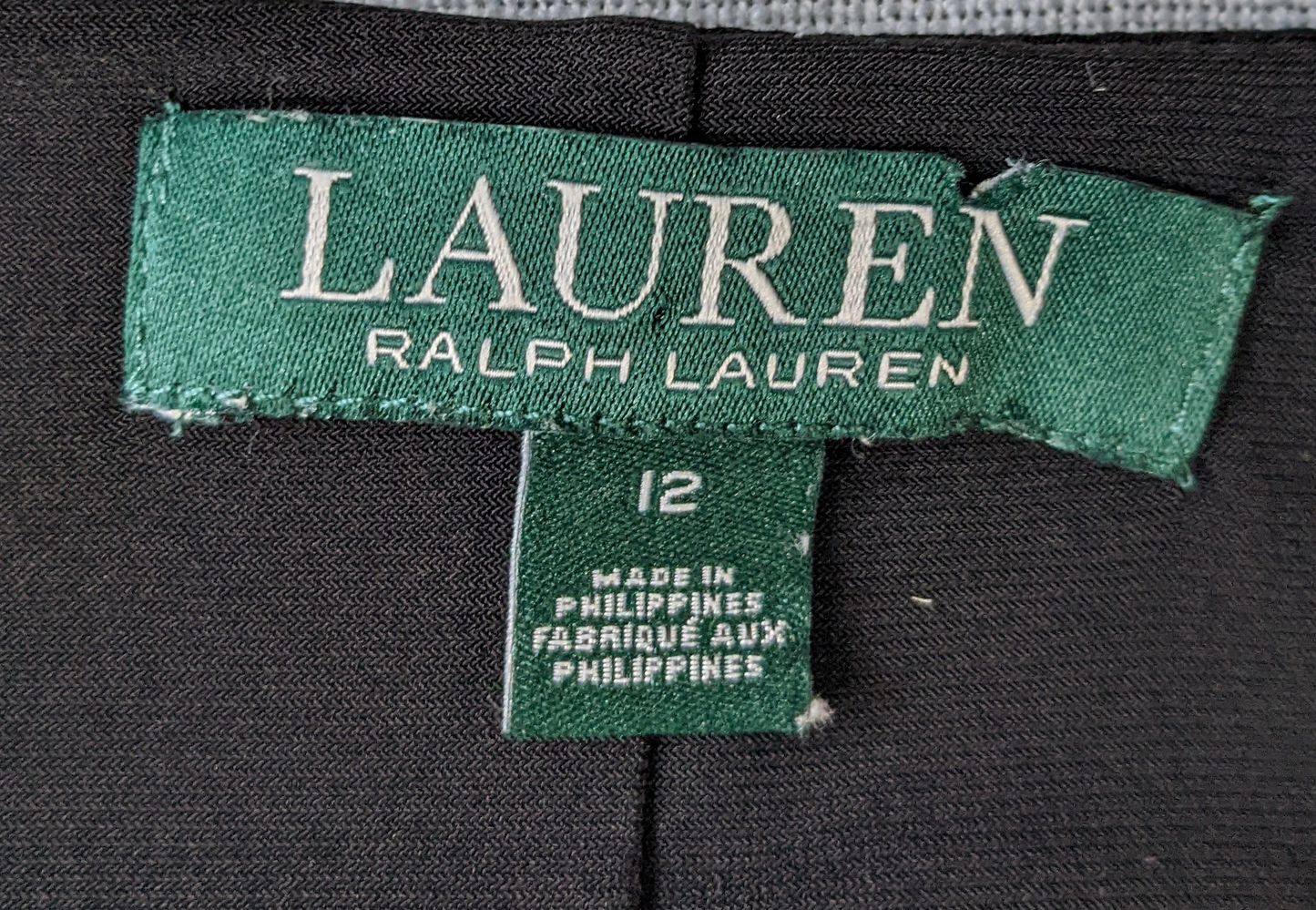 Lauren by Ralph Lauren Black Faux Wrap V-neck side ruched dressThis is the perfect Little Black Dress.  With classic styling and soft comfort, you can wear it for any occasion!