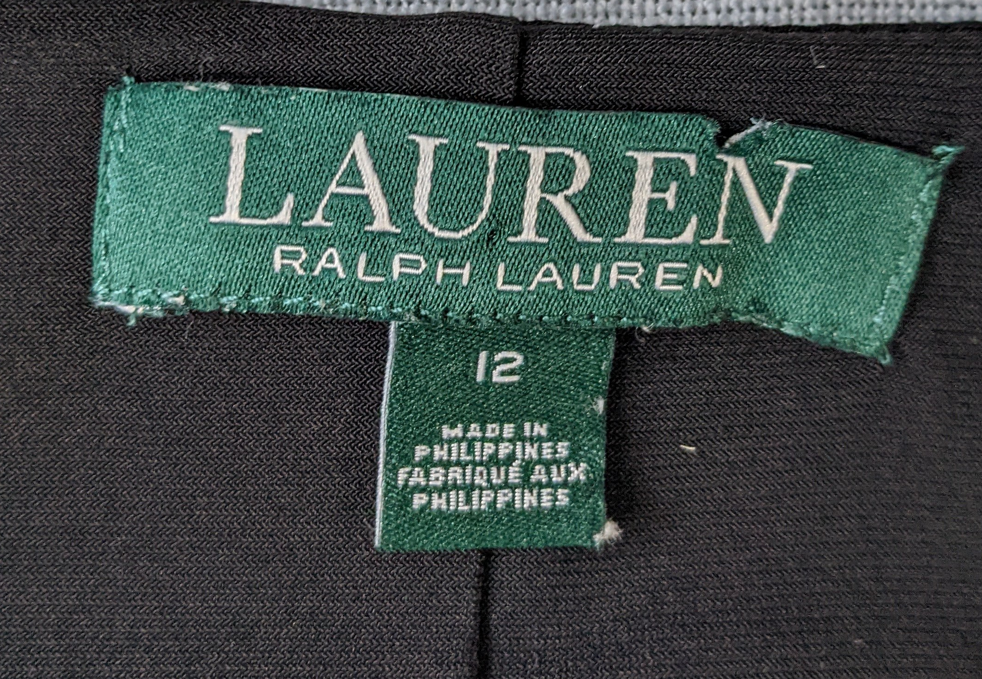 Lauren by Ralph Lauren Black Faux Wrap V-neck side ruched dressThis is the perfect Little Black Dress.  With classic styling and soft comfort, you can wear it for any occasion!