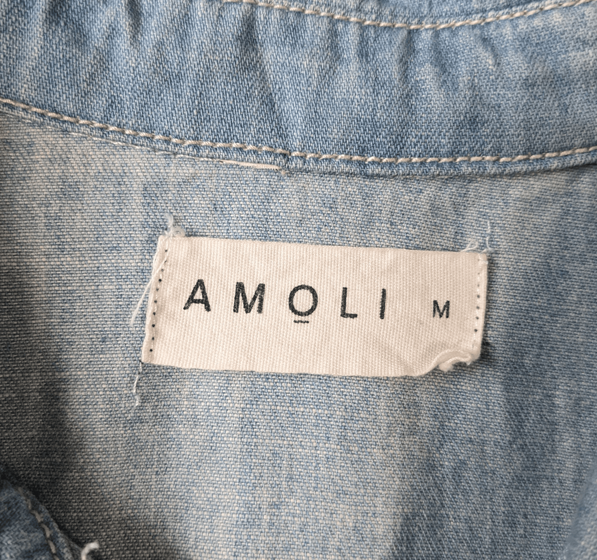 Amoli Distressed Denim TunicYou can wear this as a jacket or a dress, either way it will look great!  Show your style with this great distressed piece.