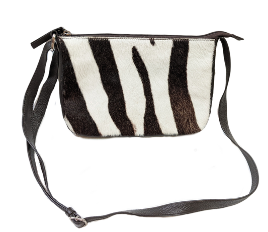 Faux Zebra Hair purse - Unbranded  Unleash your wild side with this faux zebra hair purse! (Just don't tell the real zebras.) Featuring a trendy crossbody design an