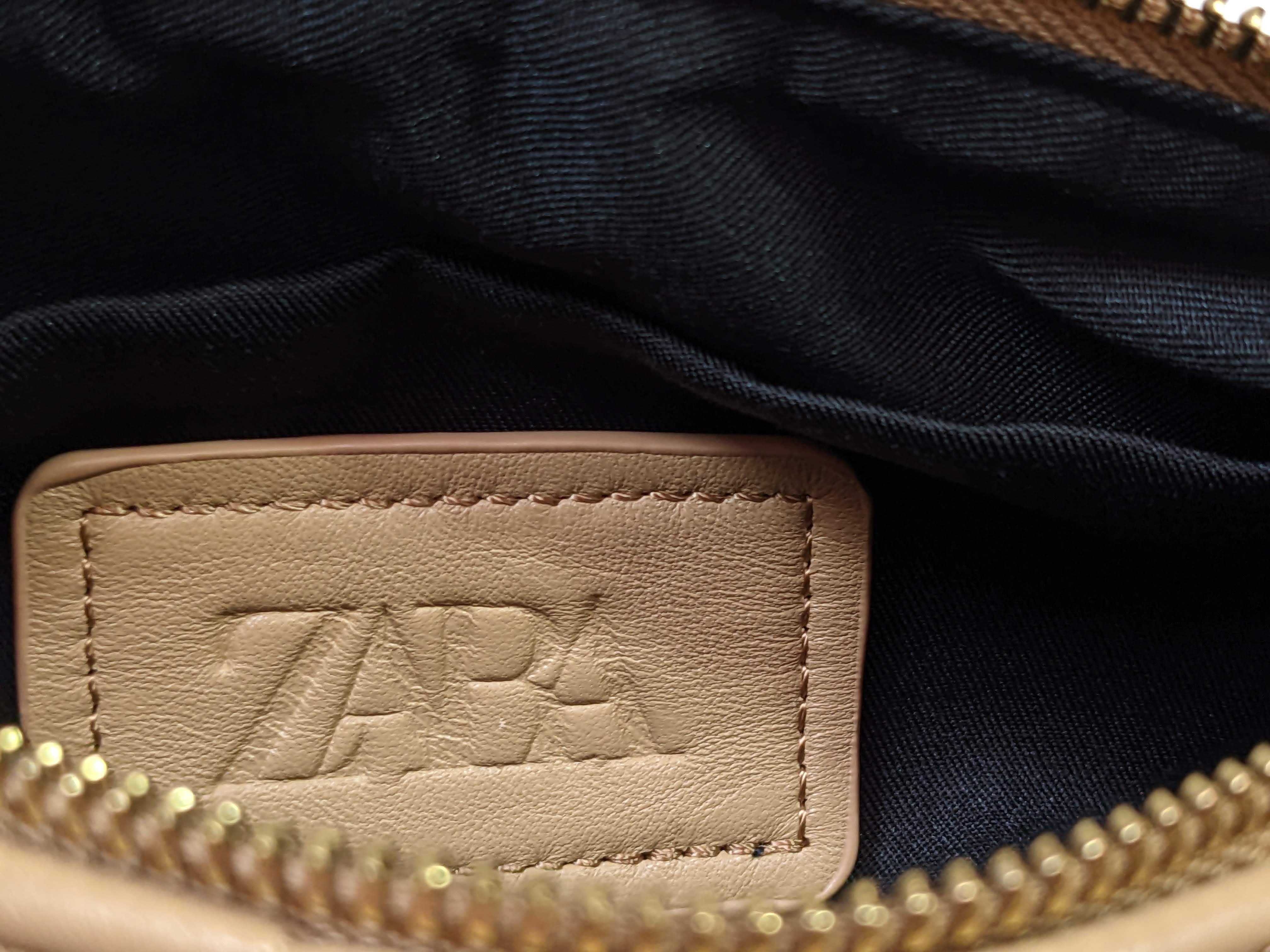 Zara Quilted Tan Leather Shoulder Bag with Gold Chain Handle - NWTSuch an awesome bag!  This can go with just about anything, and its just the right size to hold everything!
Measurements:
Length:  13"   Width: 3"   Height: 6"Zara Quilted Tan Leather Shoulder BagPurse