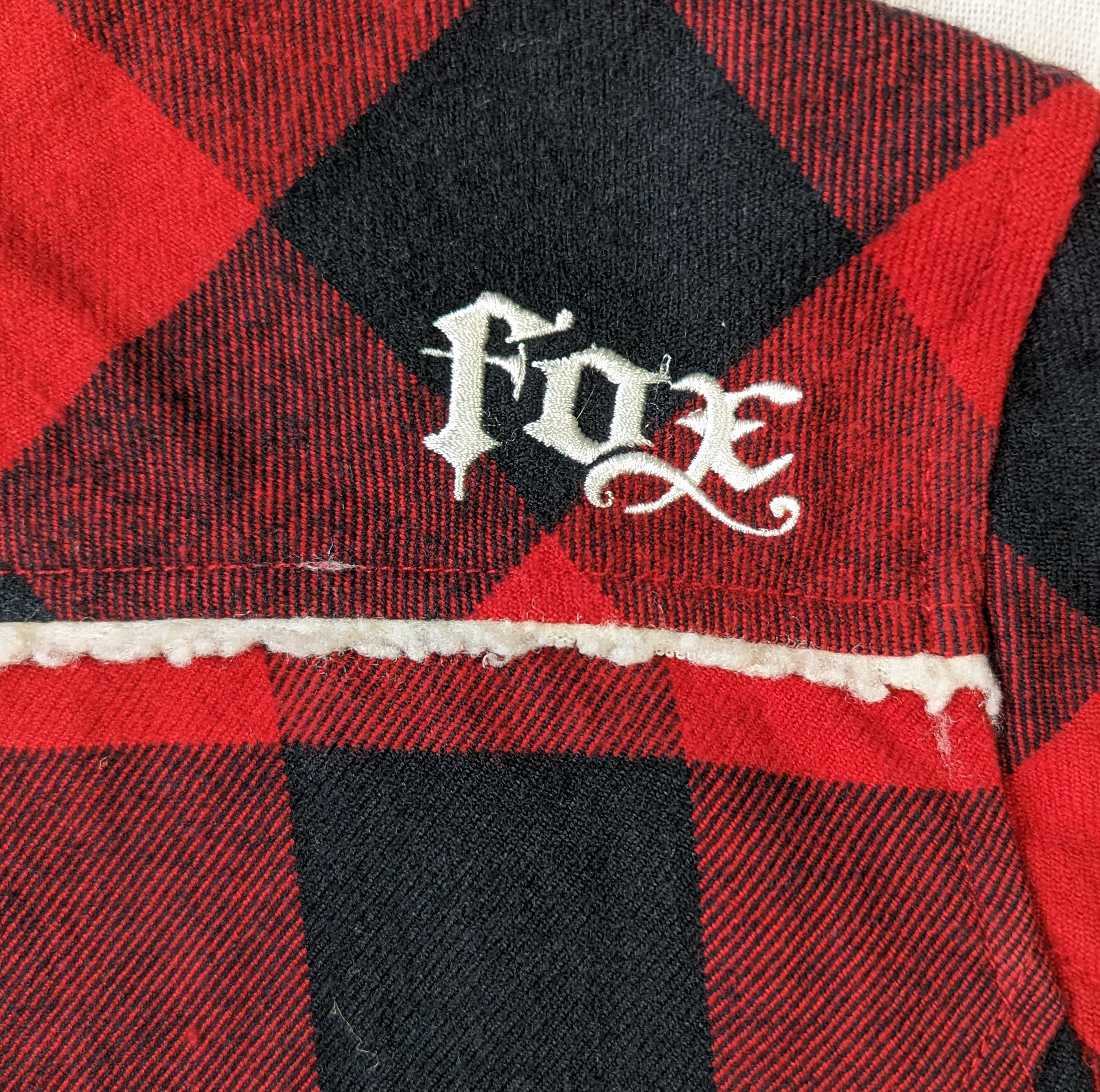 Fox Girls Black and Red Plaid Jacket Size Medium   Rock the streets in style with the Fox Girls Black and Red Plaid Jacket. This medium-sized jacket features a faux 