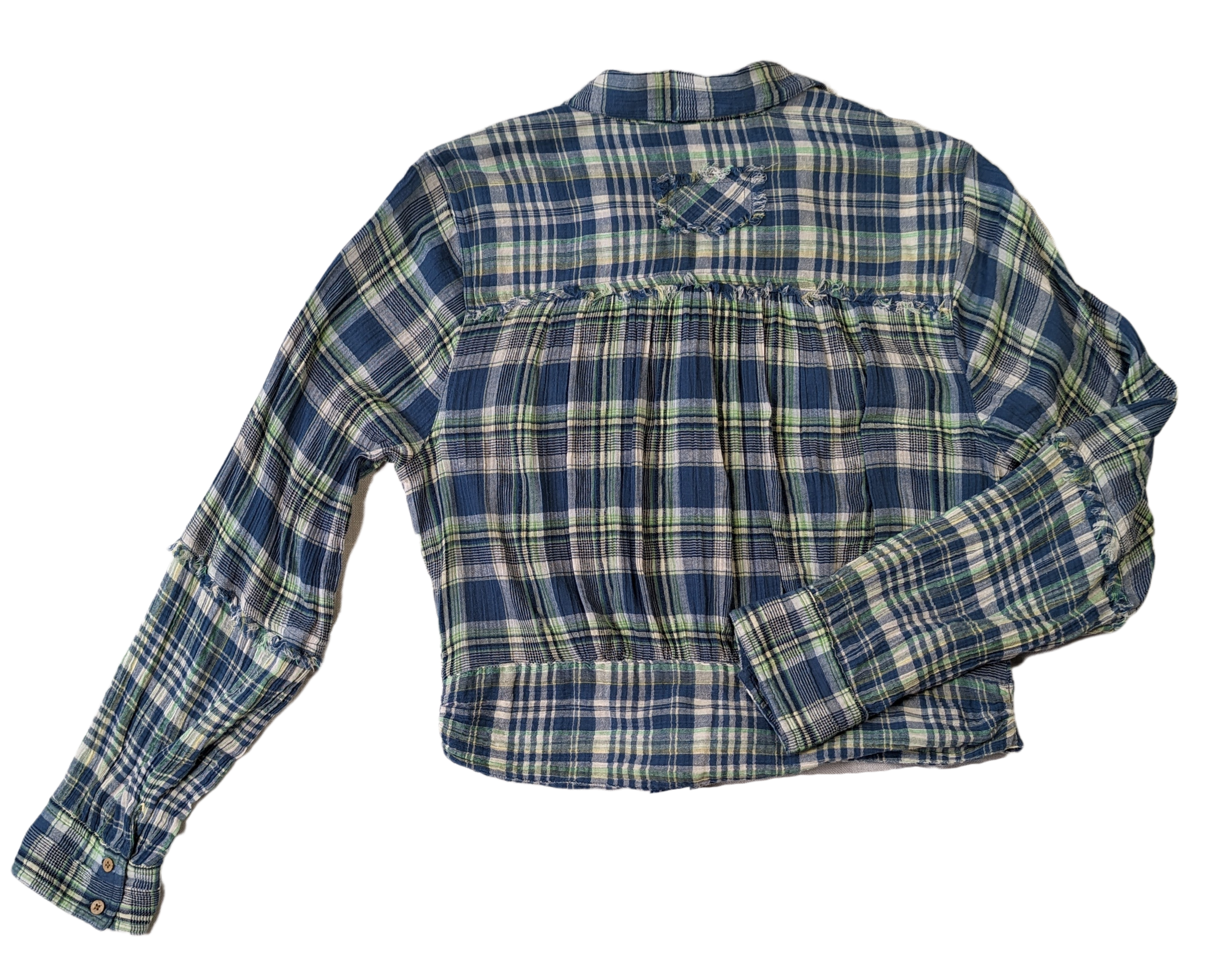 We The Free Plaid Blouse with Tie Waist The colors in this blouse are so refreshing, and can go with so many options.  Wear this gauze blouse with jeans, or a cute skirt and boots!!