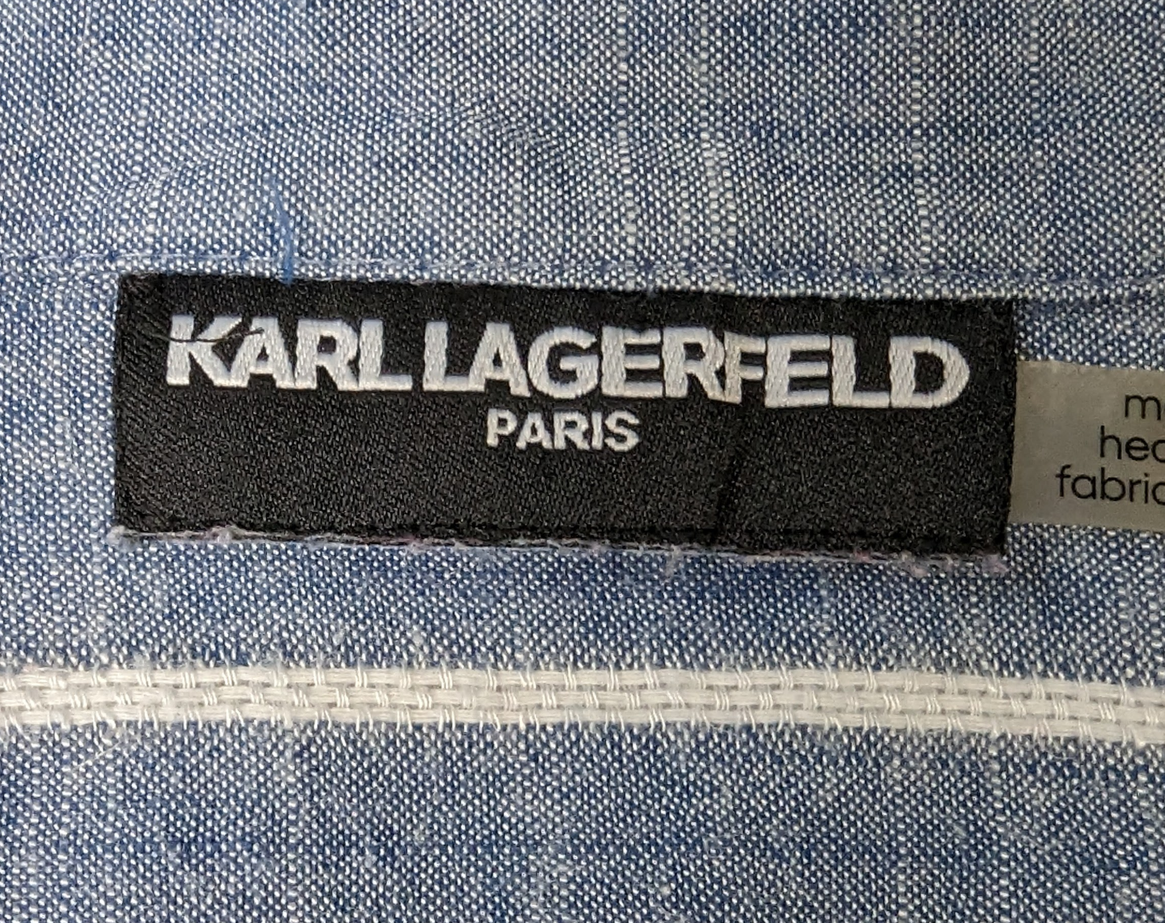 Karl Lagerfeld Paris Striped ShirtA classic style you can wear day or night!  Looks amazing with white pants or with jeans!
Measurement:  armpit to armpit - 20"
 