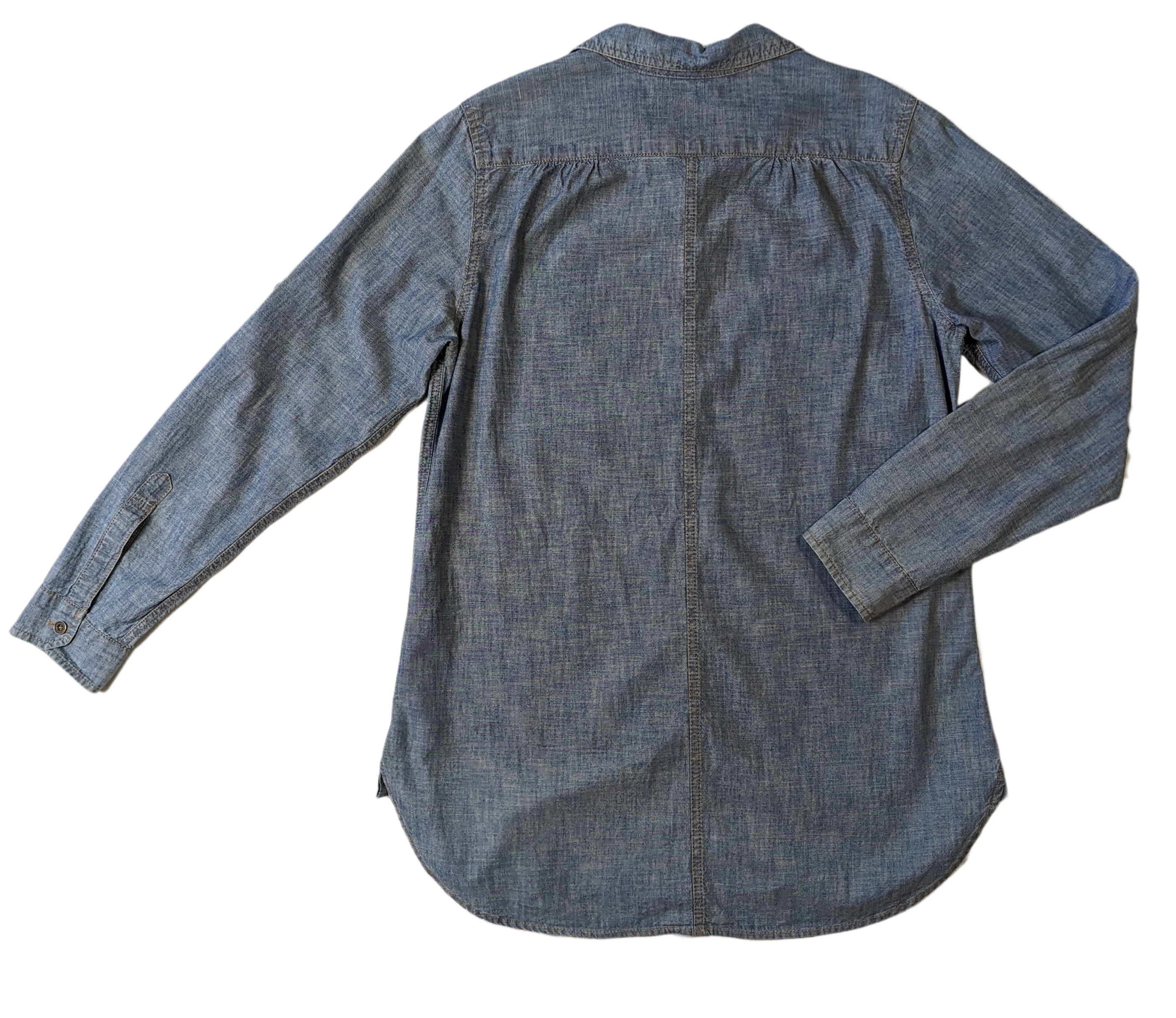 Levi's San Francisco Tunic Length Chambray Shirt A great chambray shirt can go a long way.  Wear it as a shirt, or as a short dress, or as a light-weight jacket!  Great metal buttons down the front add a nice styli