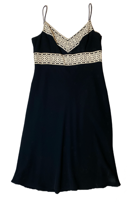 Ann Taylor Spaghetti Strap Dress with Crochet DetailBlack spaghetti strap dress with cream crochet detail at waist and V-neck line.