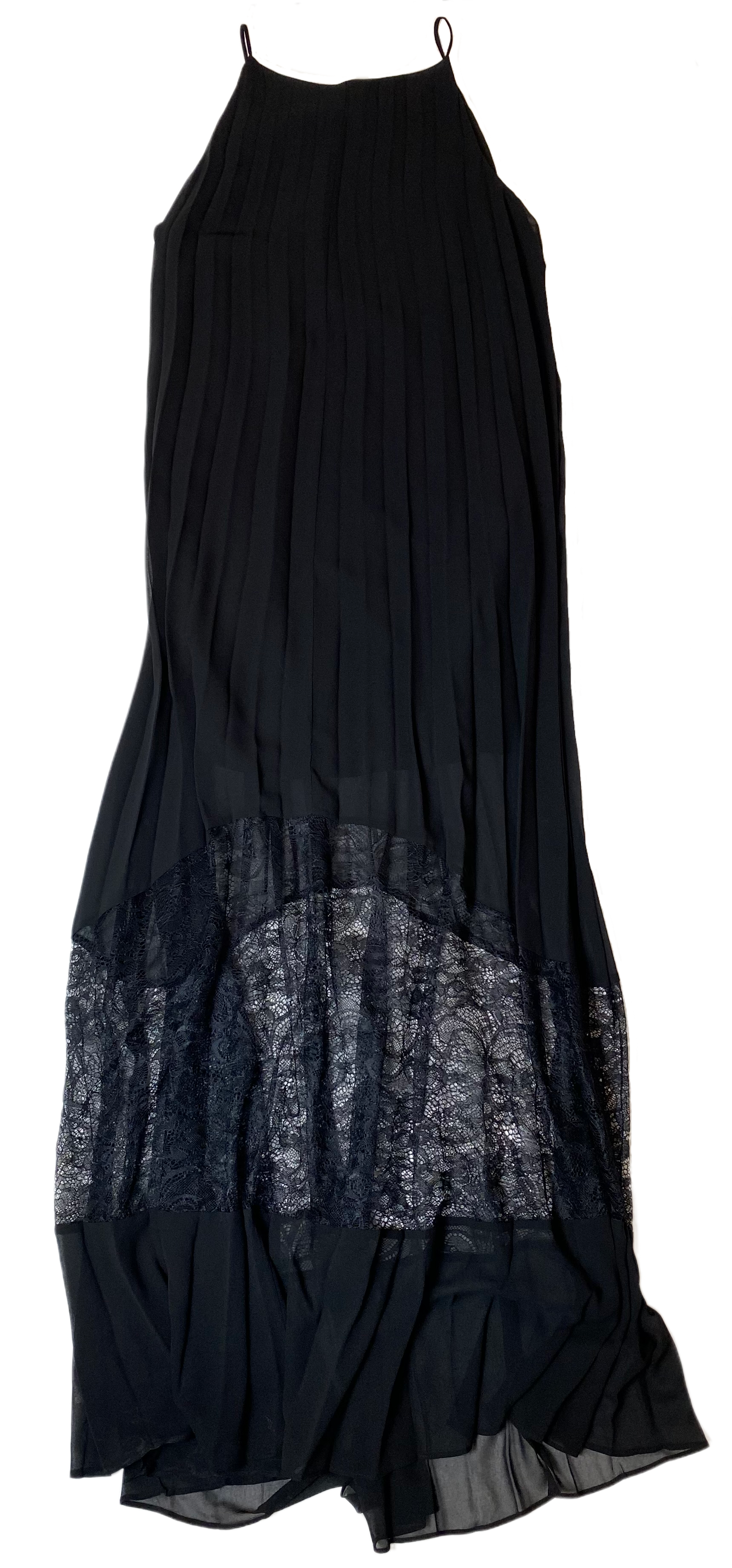 BCBG Generation Long Black Dress with Sheer Lace at BottomNeed a statement dress? This is it! Wear with strappy heels or chunky boots, either way, this dress is sure to stand out!BCBG Generation Long Black Dressdress