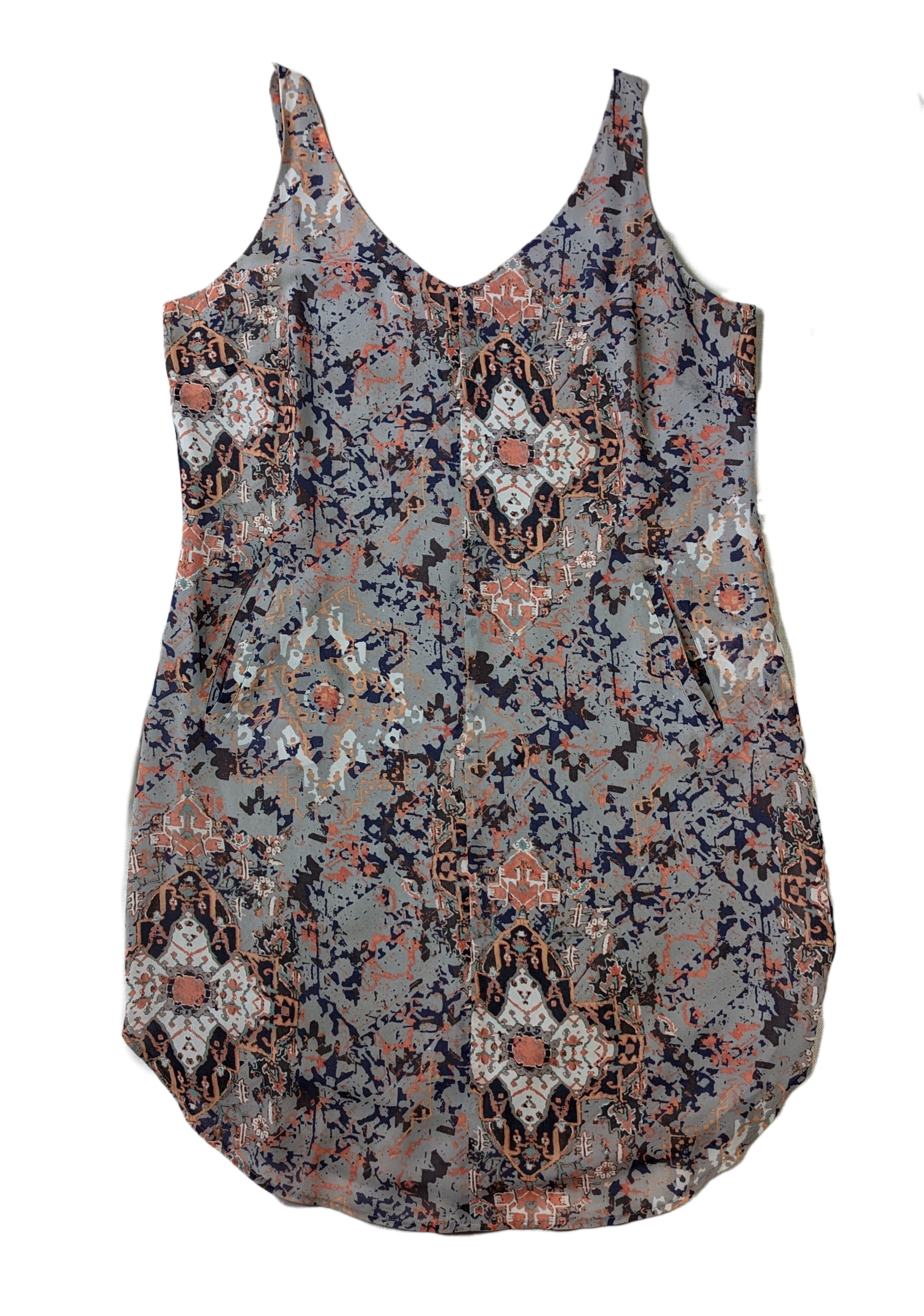 CAbi Strappy Print Dress Size M Elevate your wardrobe with the CAbi Strappy Print Dress. This size Medium dress features a unique grey, blue, white, and orange print