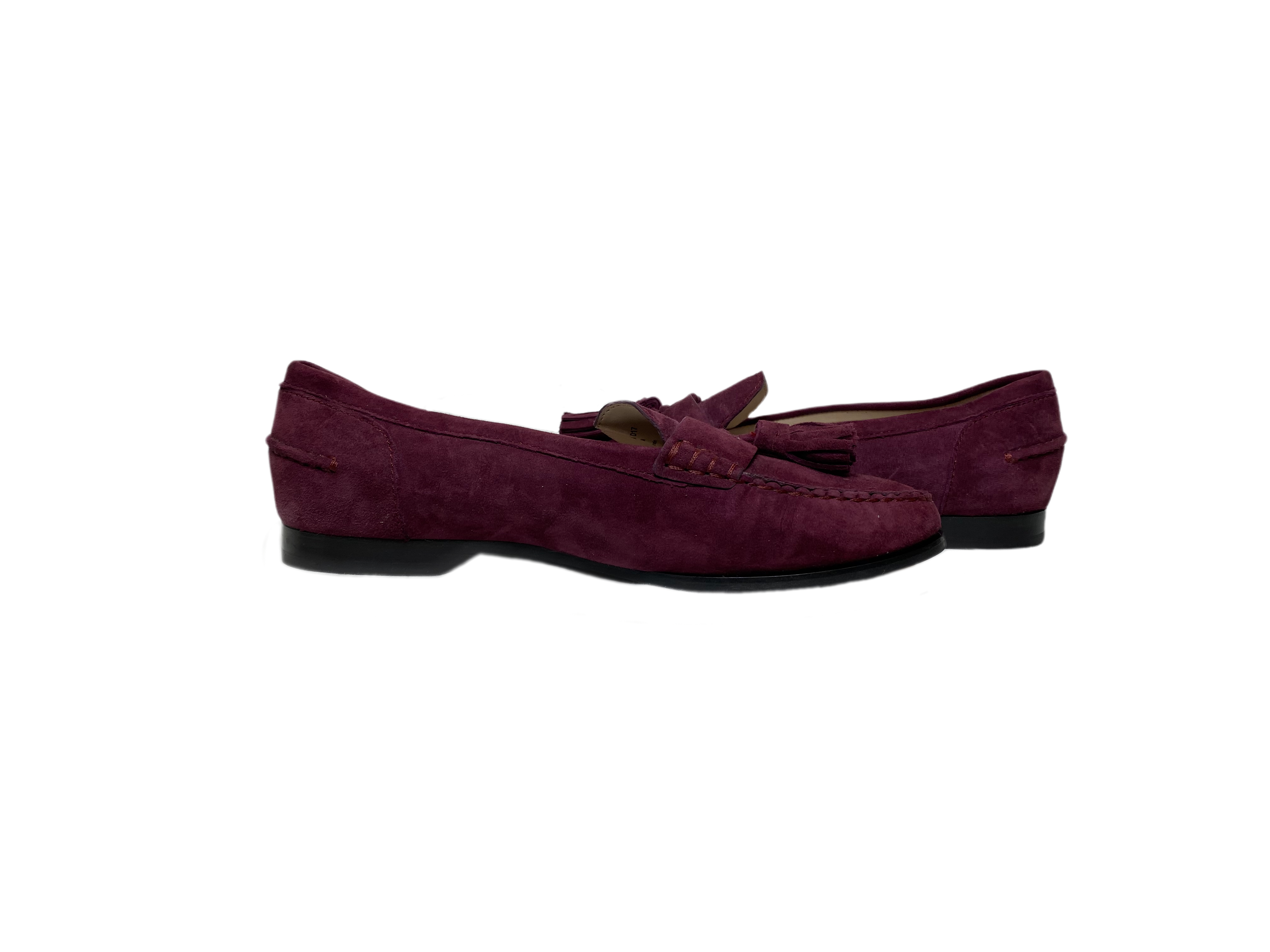 Cole Haan Plum Faux Suede Slip-On Tassel LoafersOn trend plum faux suede tassel loafers. So cute and easy to wear.
Wear these to work with black slacks, and on the go with jeans.