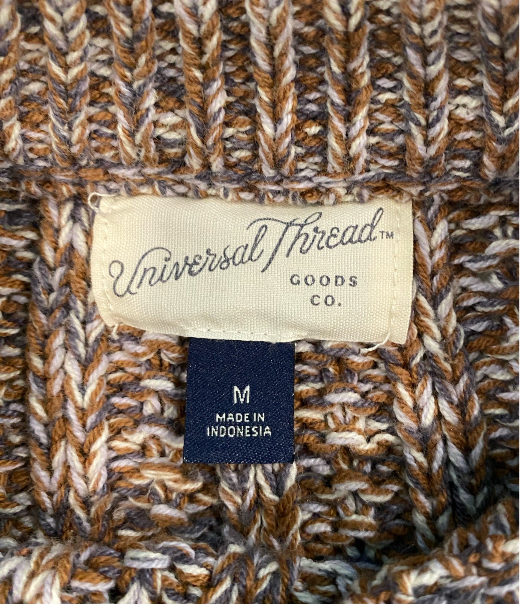 Universal Threads Chunky Brown SweaterBrown, marbled with grey and white, chunky crew neck sweater.
Perfect for Fall with black leggings and brown tall boots! Comfy and stylish!! 