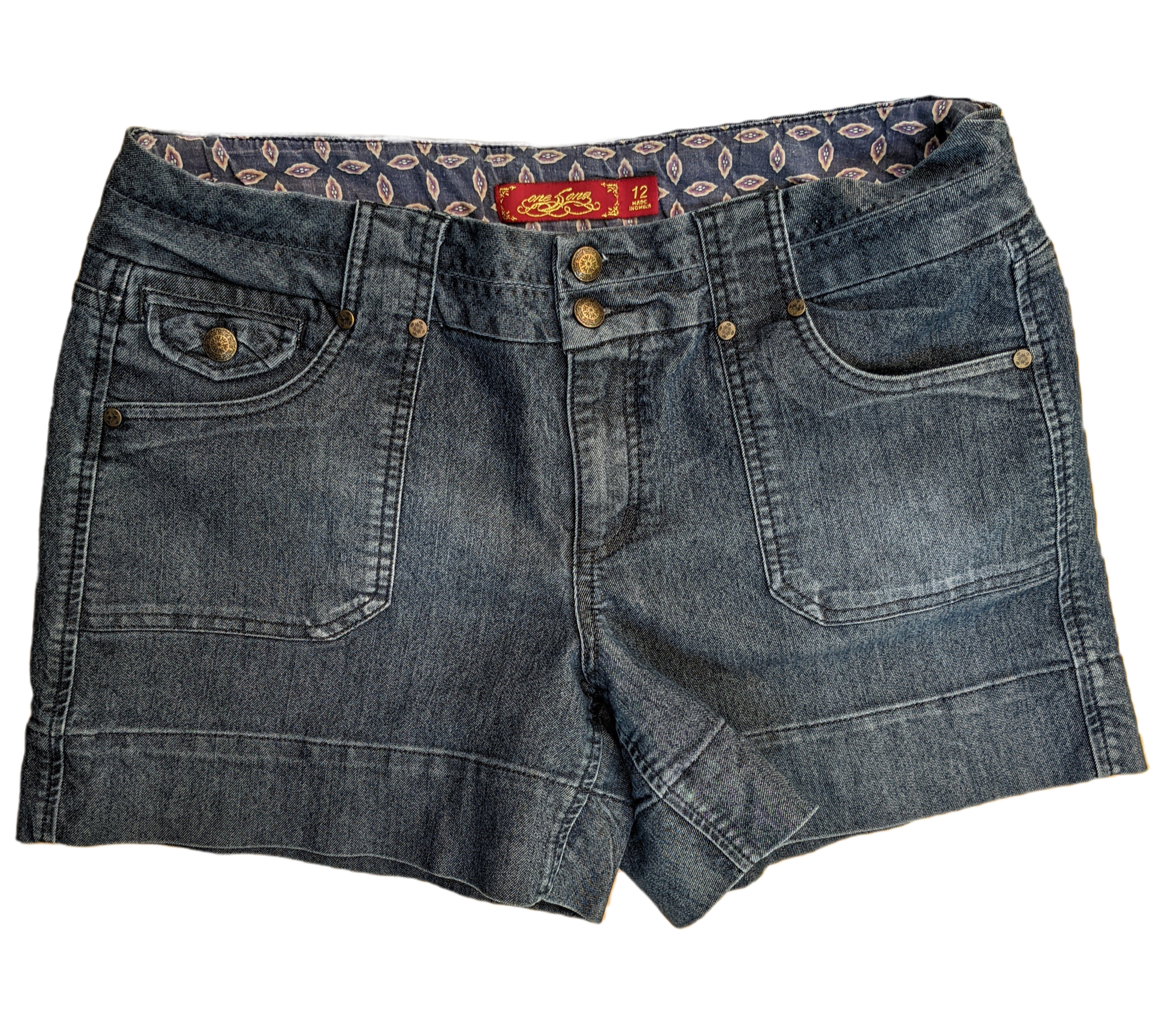 One Song Dark Denim Shorts  Size 12  Take your style to the next level with these trendy shorts that feature a touch of spandex for comfort. Perfect for any occasion