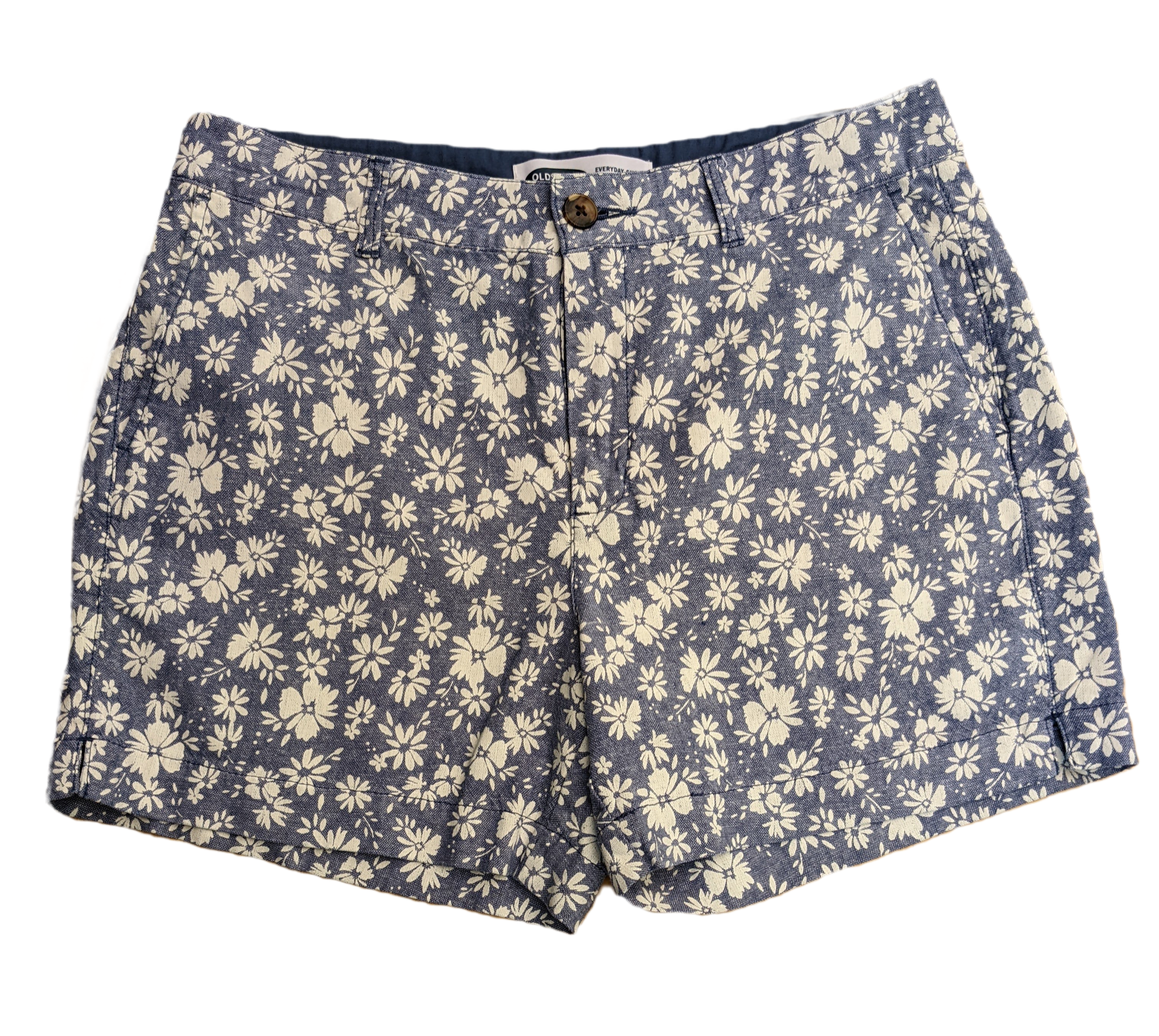 Old Navy High Rise Floral Print Shorts Old Navy high rise blue shorts with white floral print. Zip front with pockets in the front and back.