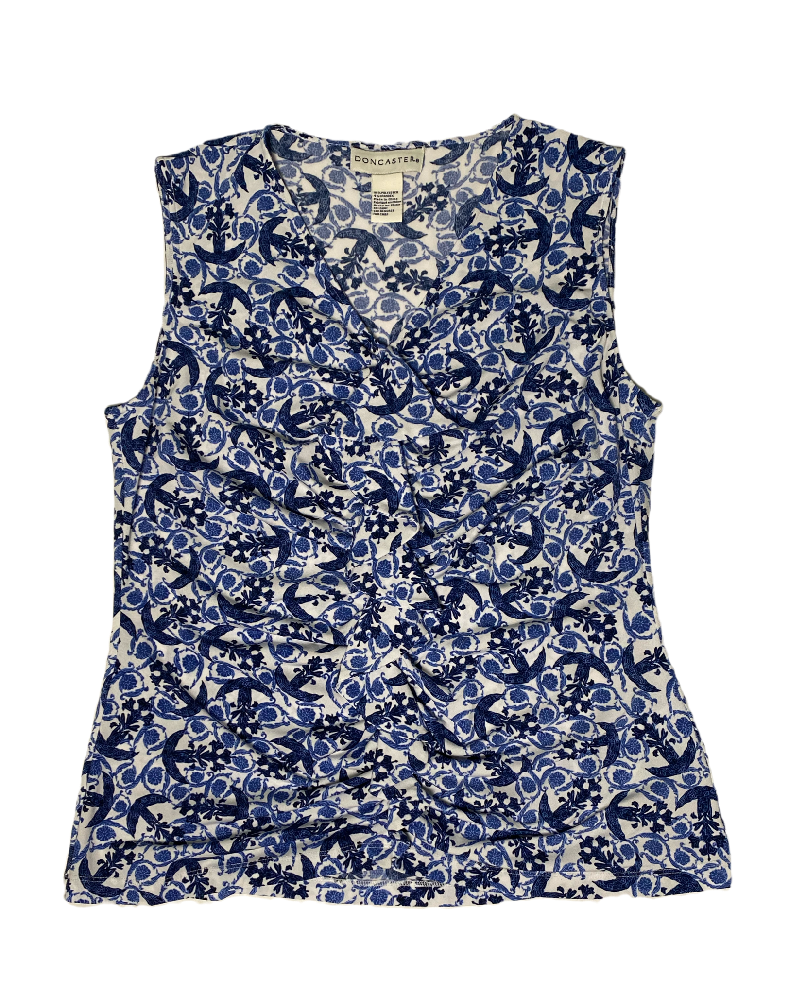 Doncaster Blue Print Sleeveless Top Doncaster blue print stretch sleeveless top with rouged/ruffled center front.