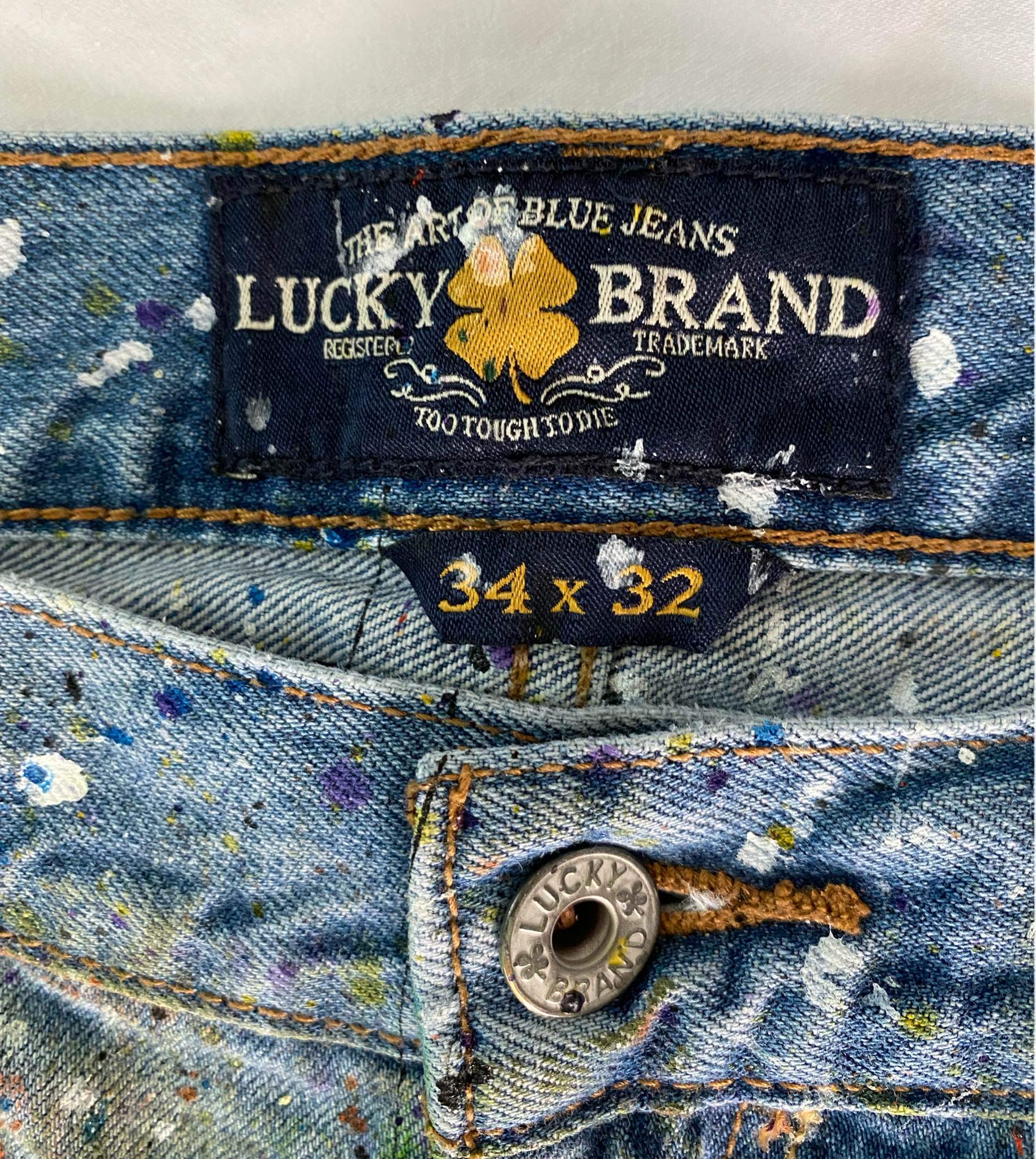 REFRESHED - Lucky Brand hand painted denim jeans. Unleash your inner cool with REFRESHED Lucky Brand Hand Painted Denim Jeans. These one-of-a-kind jeans feature a pl