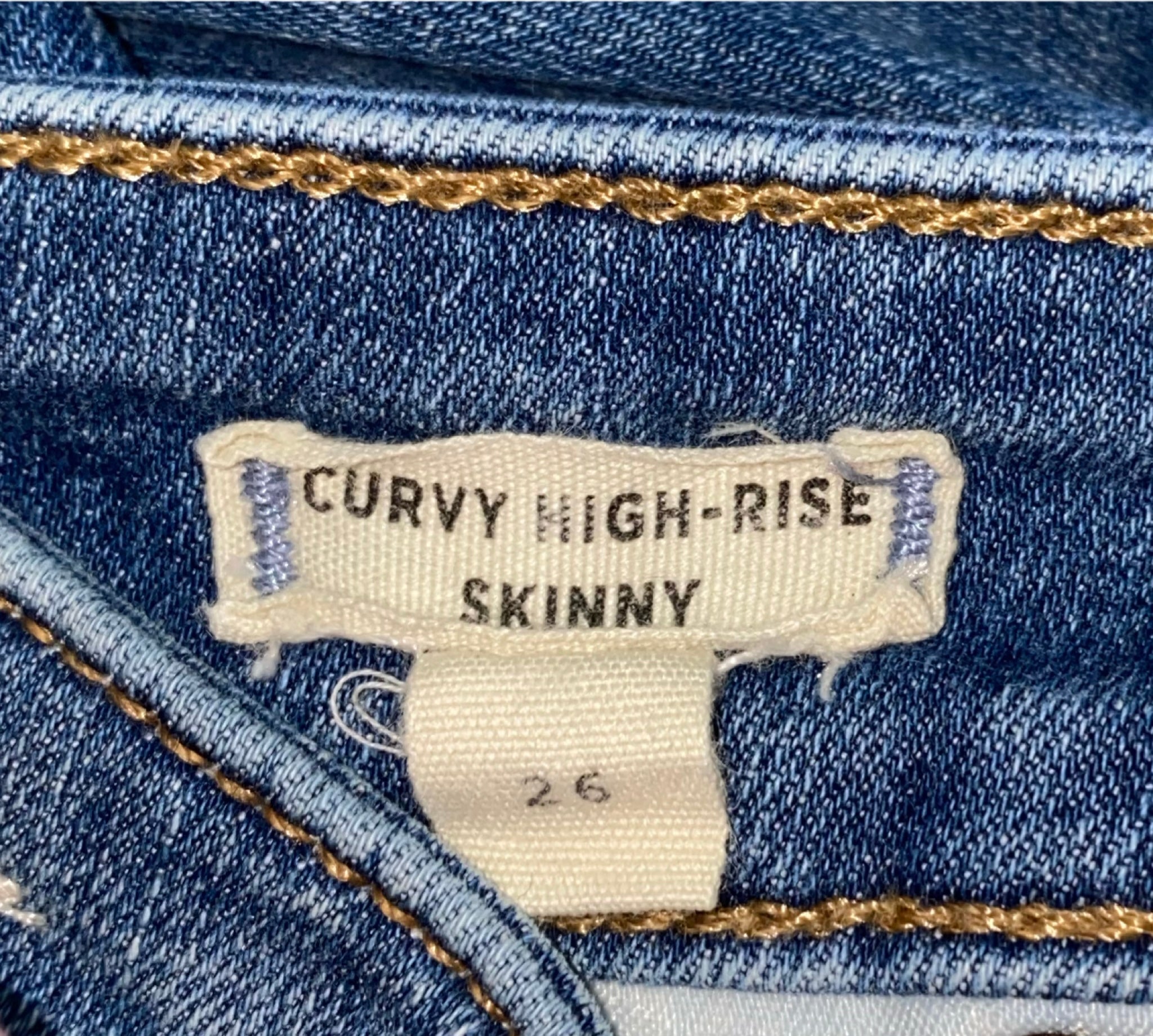 Madewell Curvy High Rise Skinny Jeans Distressed high rise blue denim jeans.