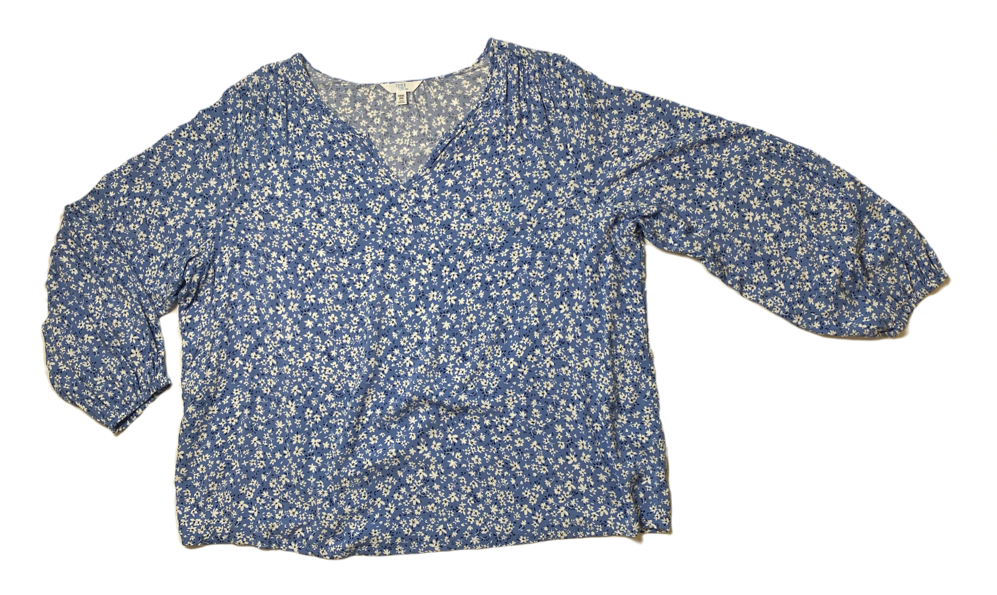 Time & TruTime &amp; Tru blue and white floral print top with split neck and long sleeves with puff at bottom.
Pair this with white or light blue capris for a perfect outfit.Womens TopsTime & Tru Blue and White Floral print TopWhite Floral print Top