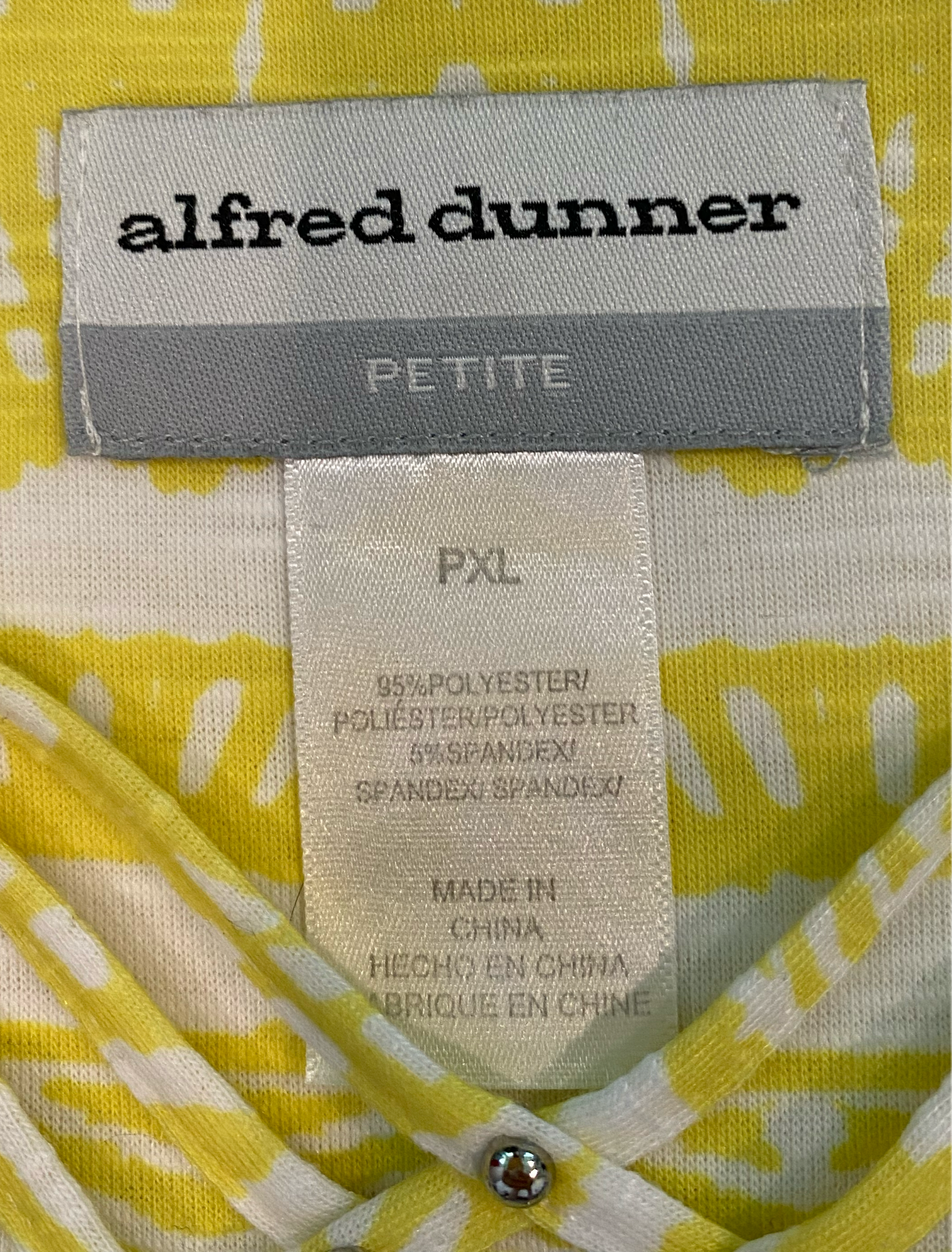 Alfred Dunner Ombre Print TopAlfred Dunner ombre print top with 3/4 sleeves and criss cross details at neck.