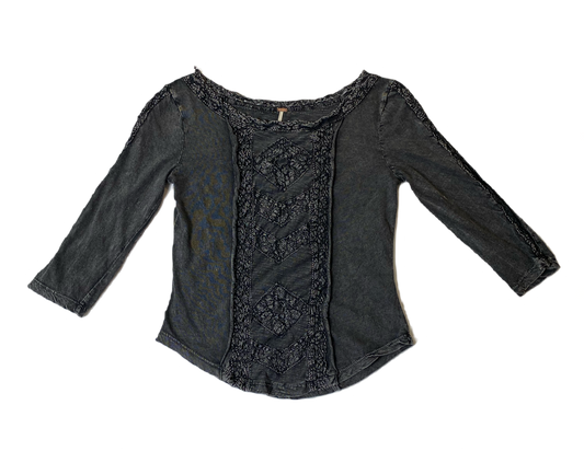 Free People Black Shirt with Lace Style DetailsFree People black shirt with lace style details on front and boat neck.