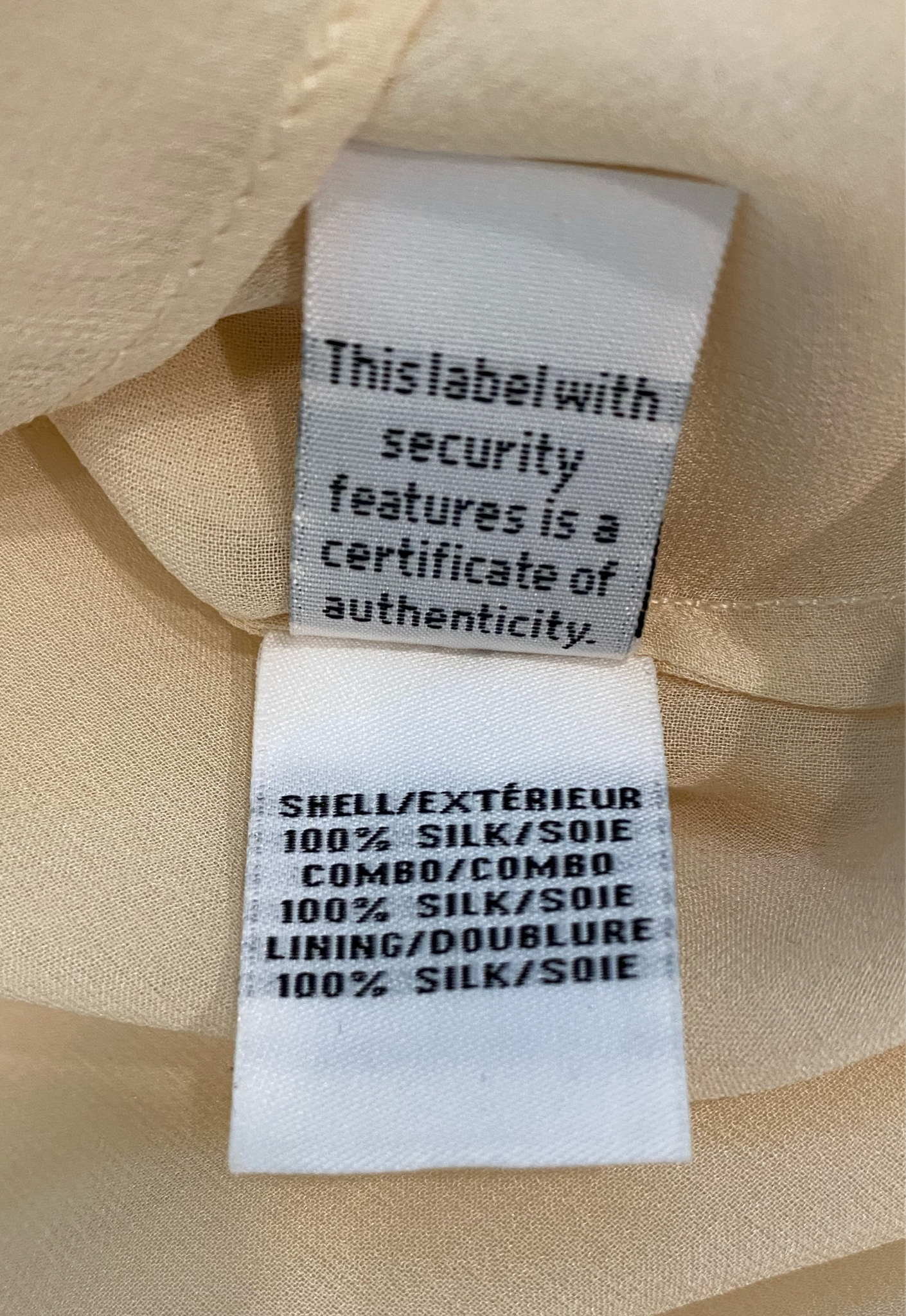 Diane Von Furstenberg Long Sleeve Silk Cream BlouseDVF sheer silk lined cream blouse with long sleeves and band detail at neck line. Hidden button front and button cuffs. 
This timeless blouse can easily be dressed u