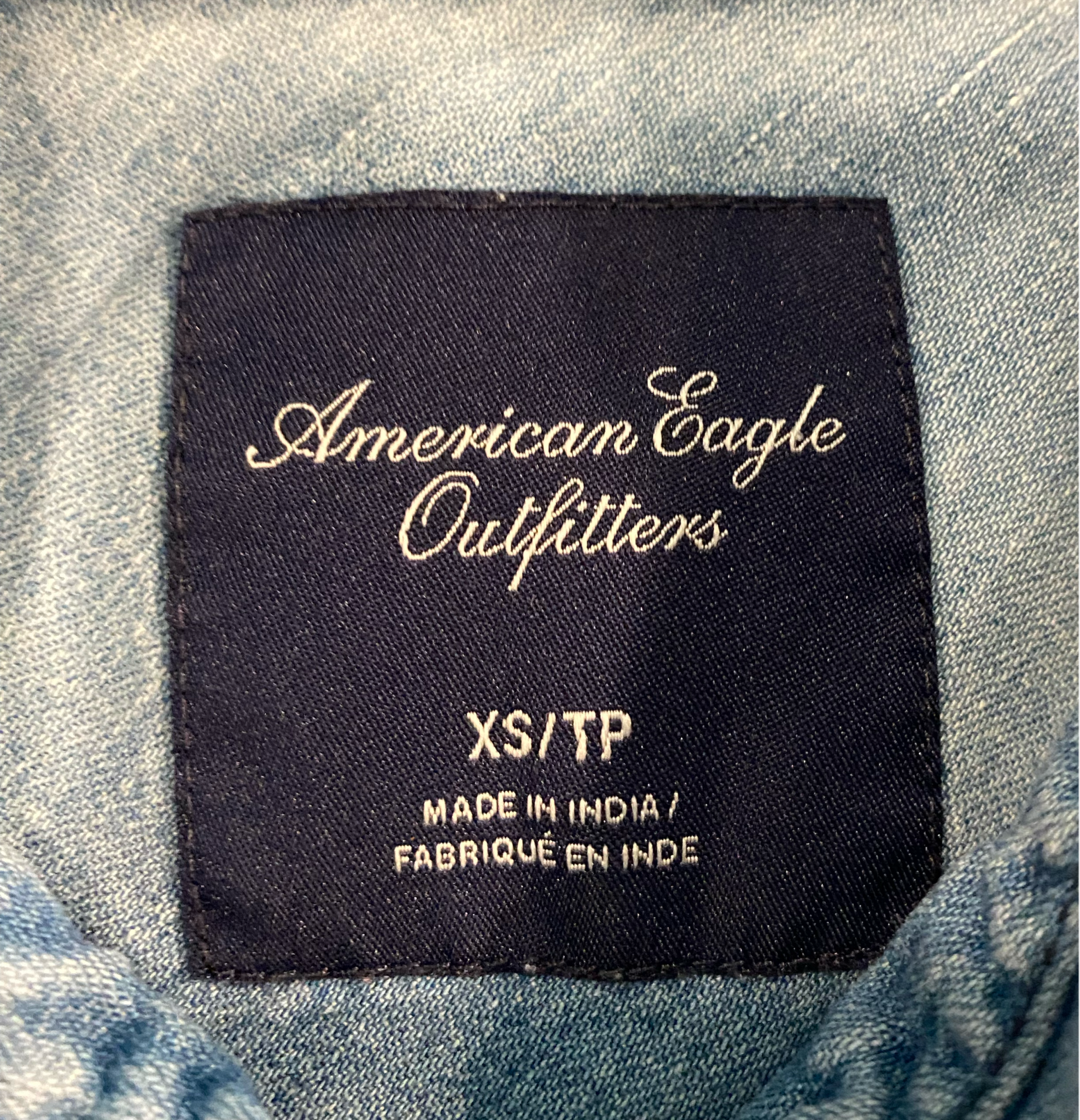 American Eagle Ombre Bleached Denim Shirt Long sleeve, ombre bleached, pearl snap front shirt.
 