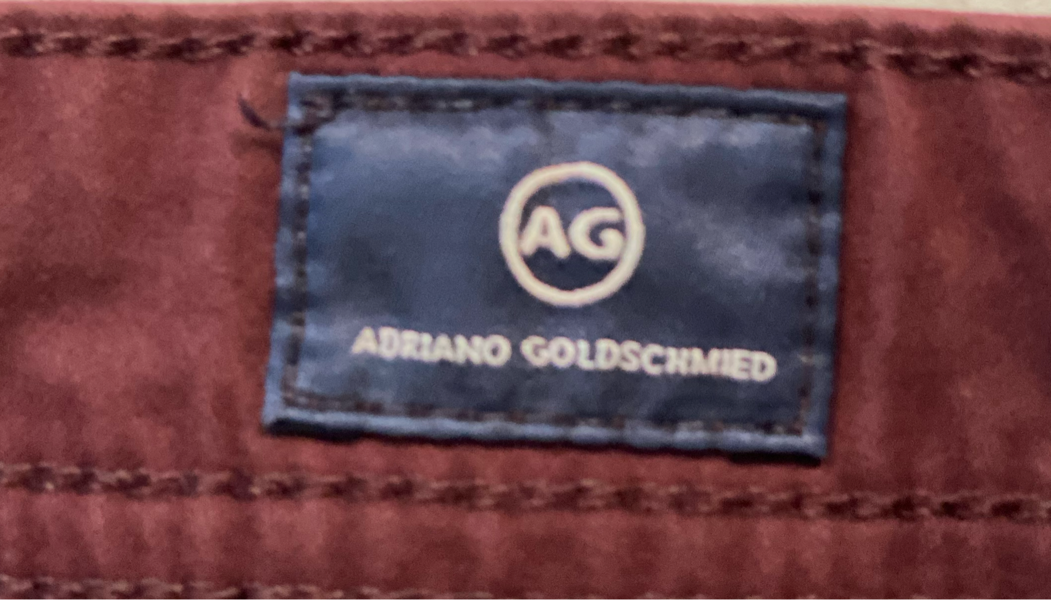 AG Adriano Goldschmied Burgundy Jeans Unleash your unique style with AG Adriano Goldschmied Burgundy Jeans. These straight leg jeans feature a 5 pocket style and are