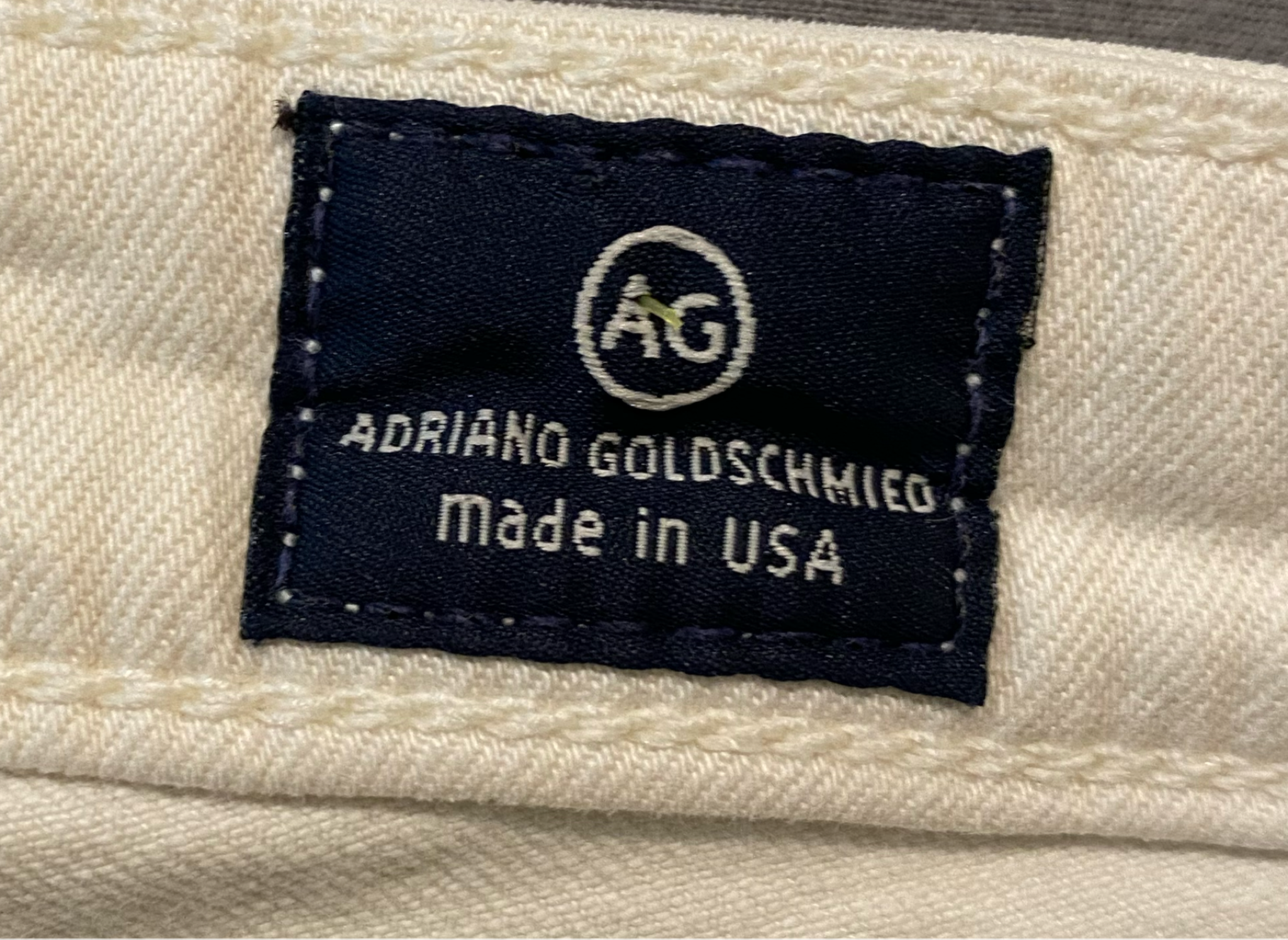 AG Adriano Goldschmied White Jeans Size 26R  Get ready to strut your stuff in these AG Adriano Goldschmied White Jeans! With a five pocket style and straight leg cut