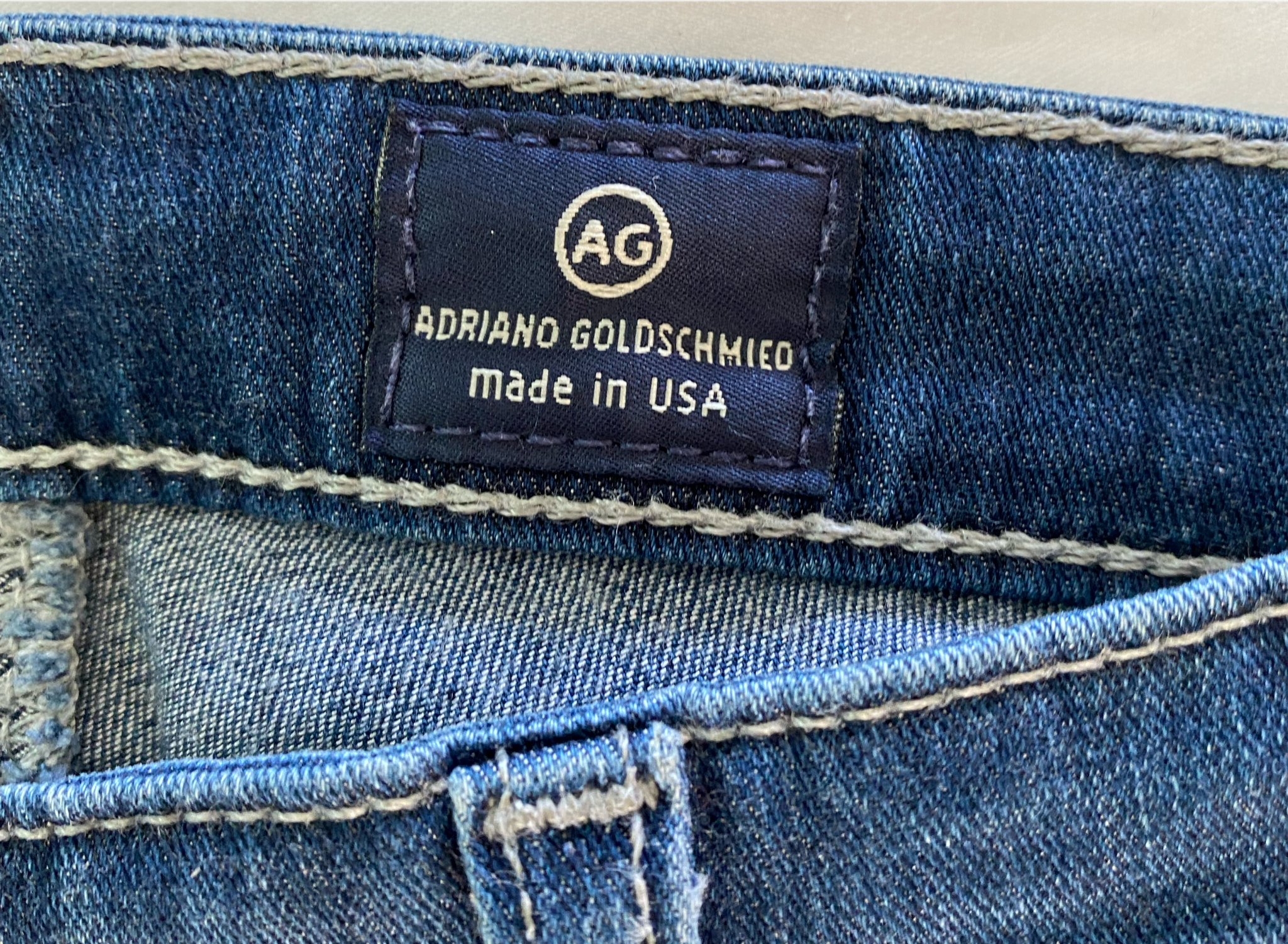 AG - Adriano Goldschmied The Angel Boot Cut Jeans Size 27R A dark-yet-bright indigo wash adds everyday sophistication to low-rise, full-length bootcut jeans made fro