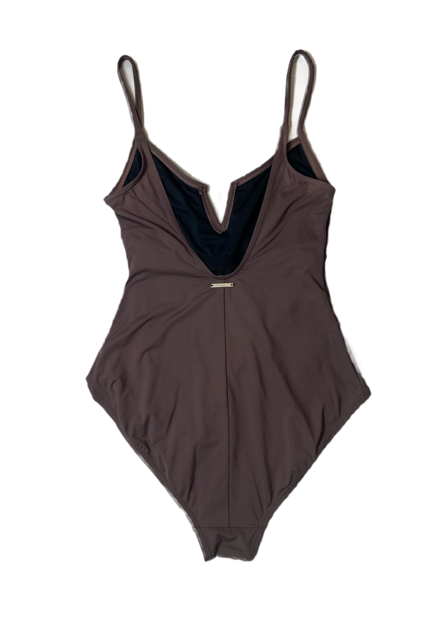 Vince Camuto Plum Colored One Piece Swim Suit Dive into playful elegance with the Vince Camuto One Piece Swim Suit. This unique plum colored suit features a deep V n