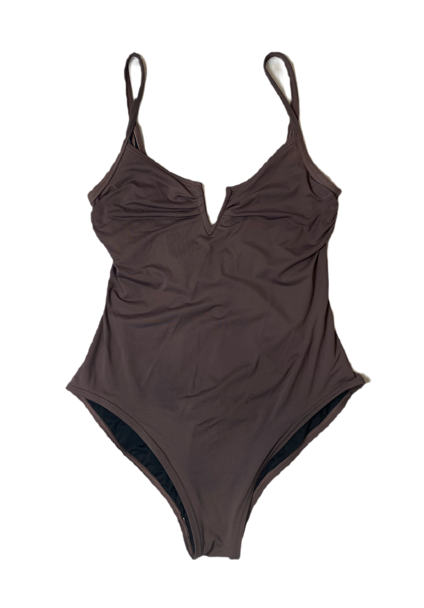 Vince Camuto Plum Colored One Piece Swim Suit Dive into playful elegance with the Vince Camuto One Piece Swim Suit. This unique plum colored suit features a deep V n