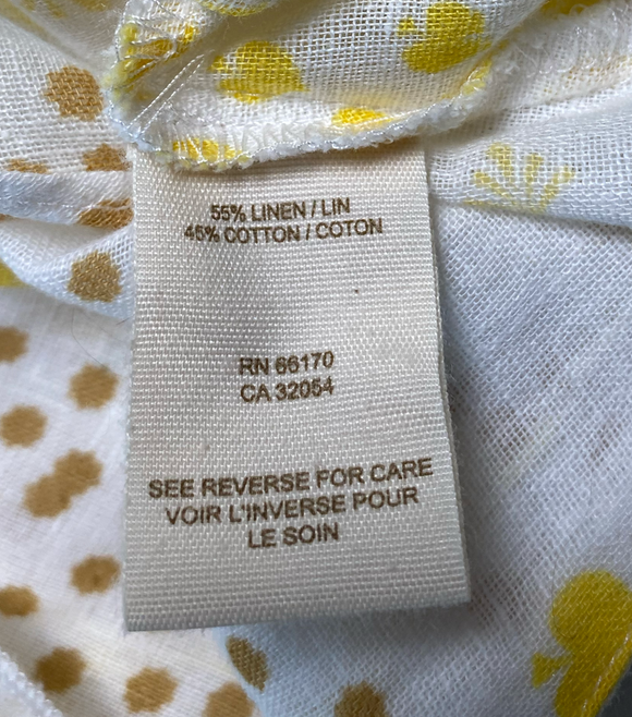 Free People Linen Button-down Strappy TankSuch a great tank!  It has it all - ruffles, buttons, and adjustable straps! Plus, a cute floral print!