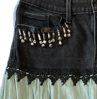 REFRESHED - Black Denim Levi's Skirt Refreshed Black Levi's with an Ombre Gauze skirt and lace embellishments.  Beading added at front pockets, lace back pockets and lace trim around waist.