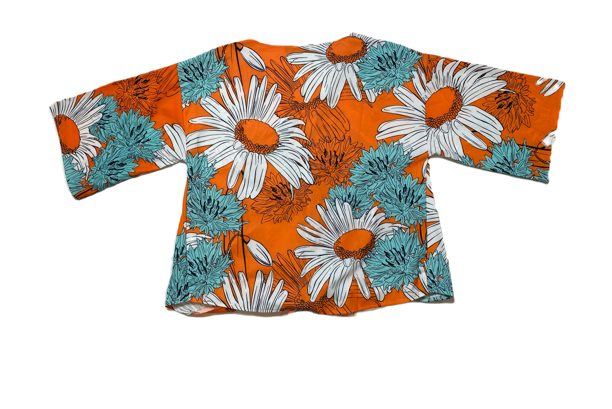 Suvimuga Orange Floral Print Blouse 
Suvimuga orange tie front blouse with floral print.