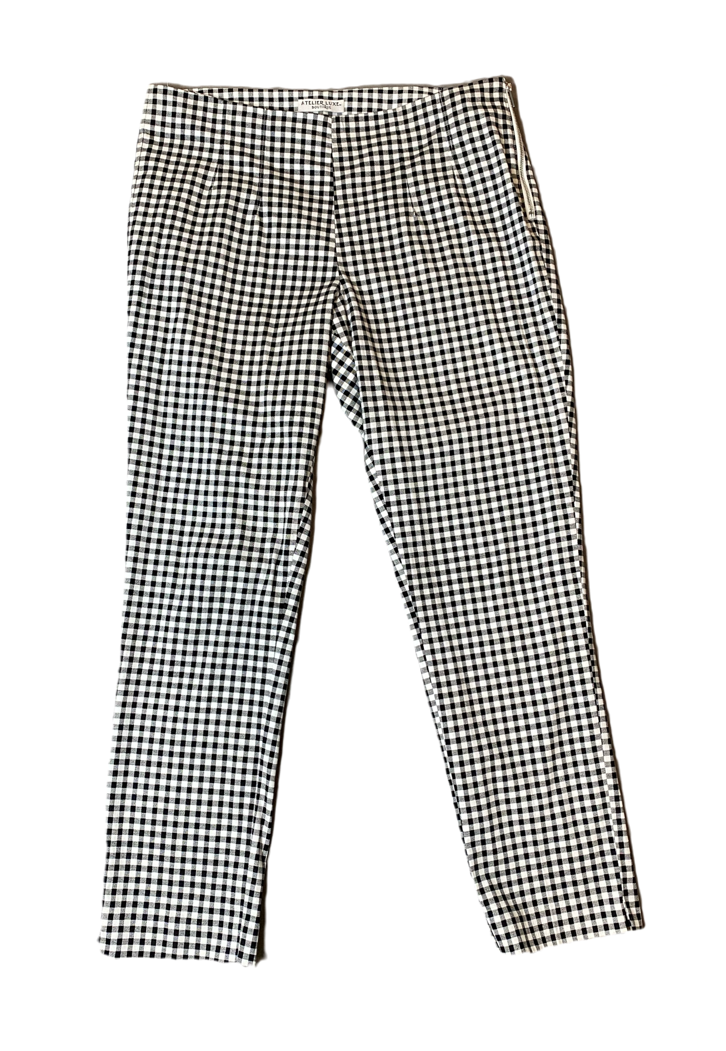 Atelier Luxe Gingham PantAtelier Luxe black and white gingham side zip pant.
Wear these pants to work, then add a little bling and a chunky heel and you are ready for a night out!