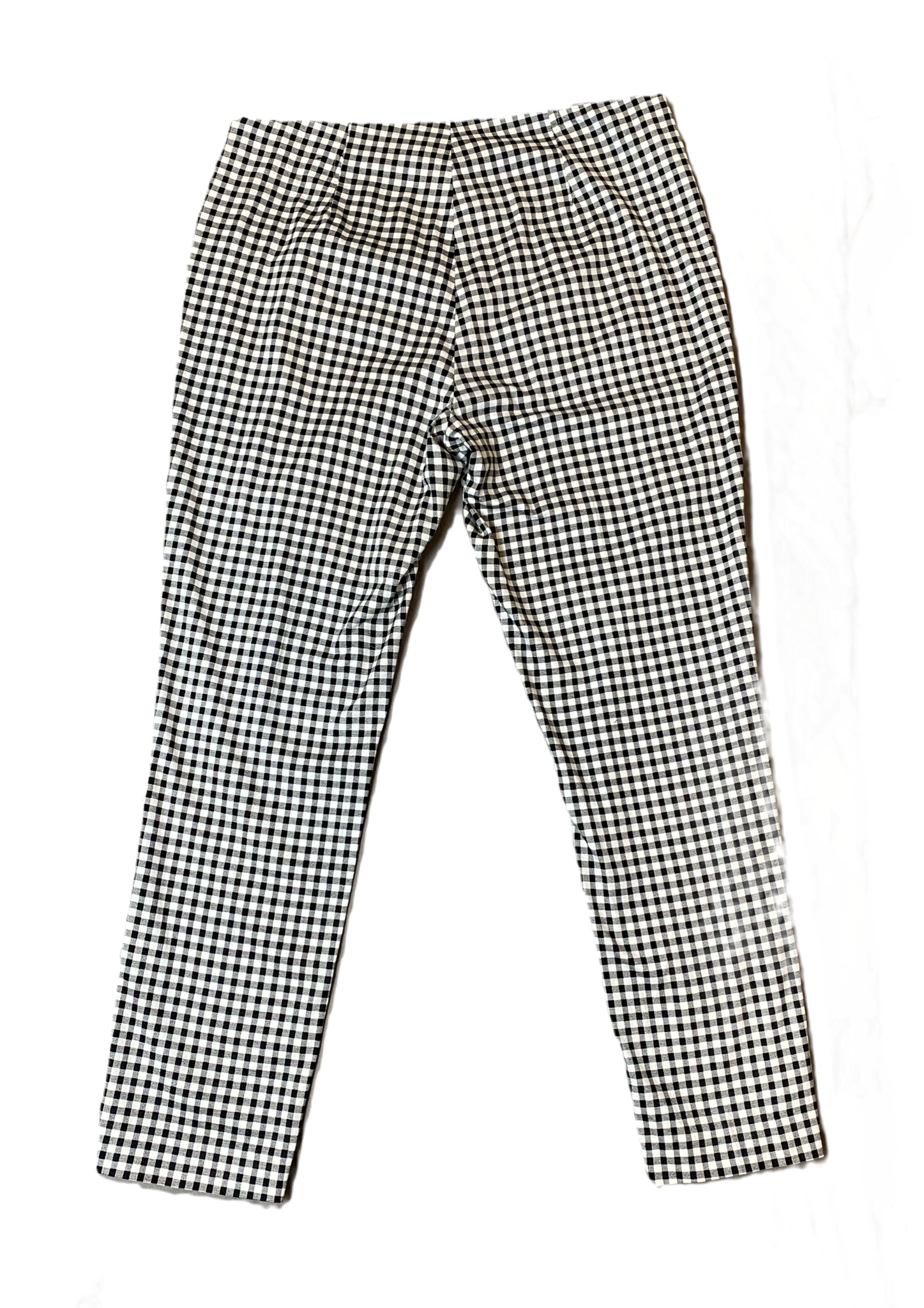 Atelier Luxe Gingham PantAtelier Luxe black and white gingham side zip pant.
Wear these pants to work, then add a little bling and a chunky heel and you are ready for a night out!