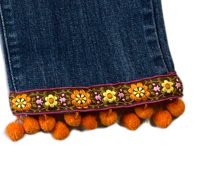 REFRESHED - Levi's Midrise Skinny Jeans, Patched and Trimmed Refreshed - Such a fun pair of jeans, with bright colored patches and pom pom trim on the bottom hem!  These will look great dressed up or down.