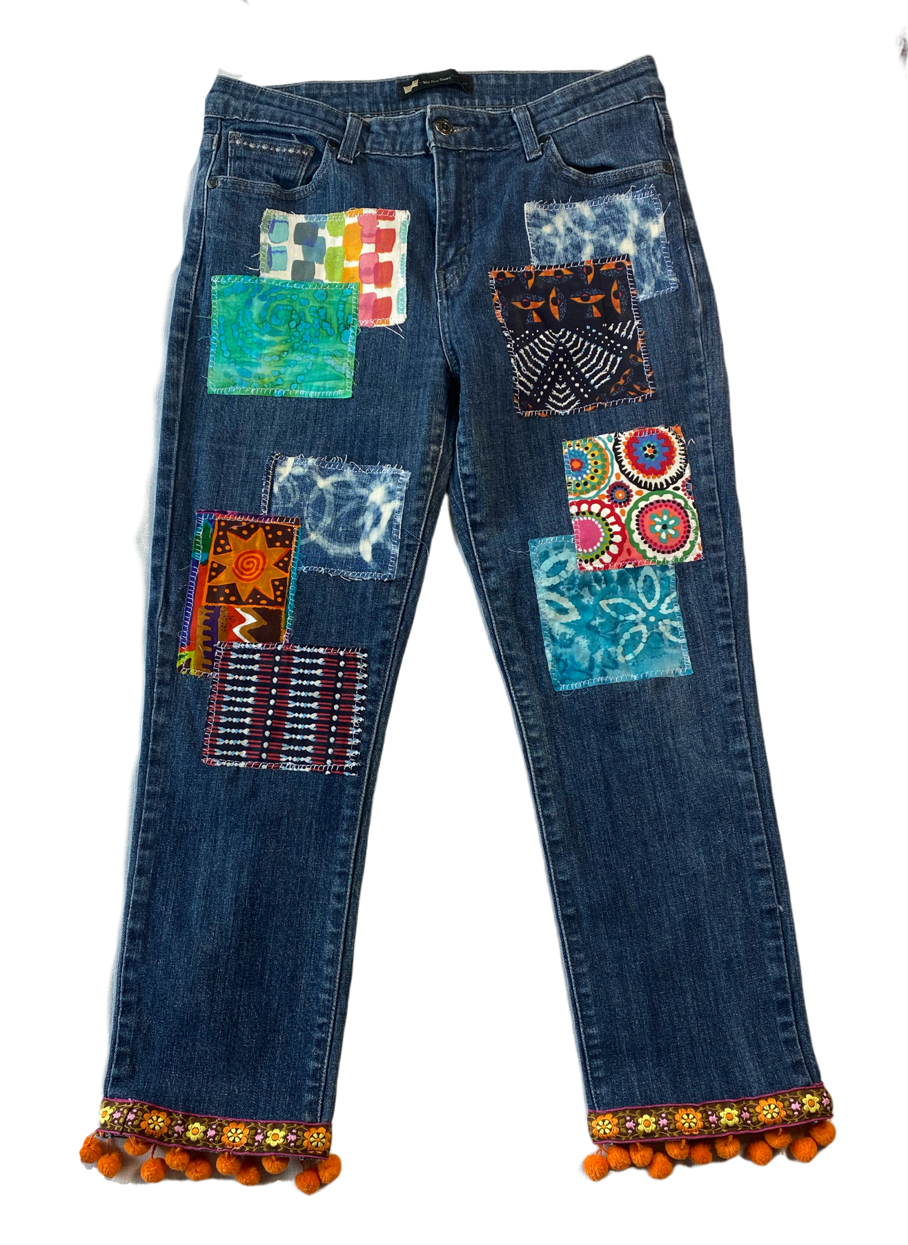 REFRESHED - Levi's Midrise Skinny Jeans, Patched and Trimmed Refreshed - Such a fun pair of jeans, with bright colored patches and pom pom trim on the bottom hem!  These will look great dressed up or down.