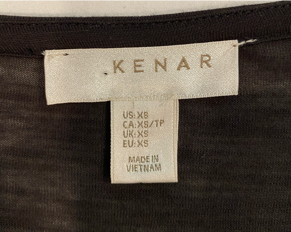 Kenar Black and White Stripe Long Sleeve Top  This Kenar top is a must-have for any fashion-forward individual! Its classic black and white stripes add a touch of so