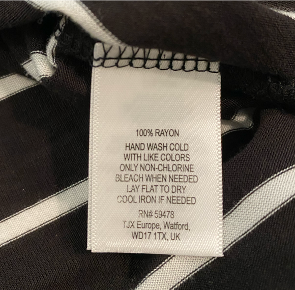 Kenar Black and White Stripe Long Sleeve Top  This Kenar top is a must-have for any fashion-forward individual! Its classic black and white stripes add a touch of so