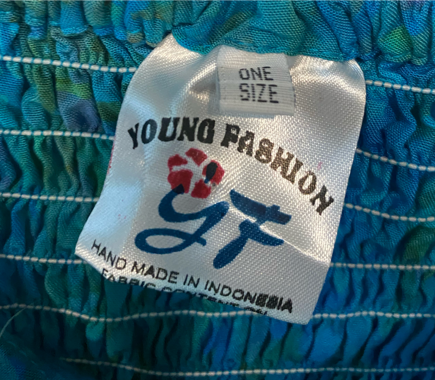 Young Fashion Print Halter DressShort blue and green print halter dress. Knot front and elastic back.
Add sandals and you are ready to go!