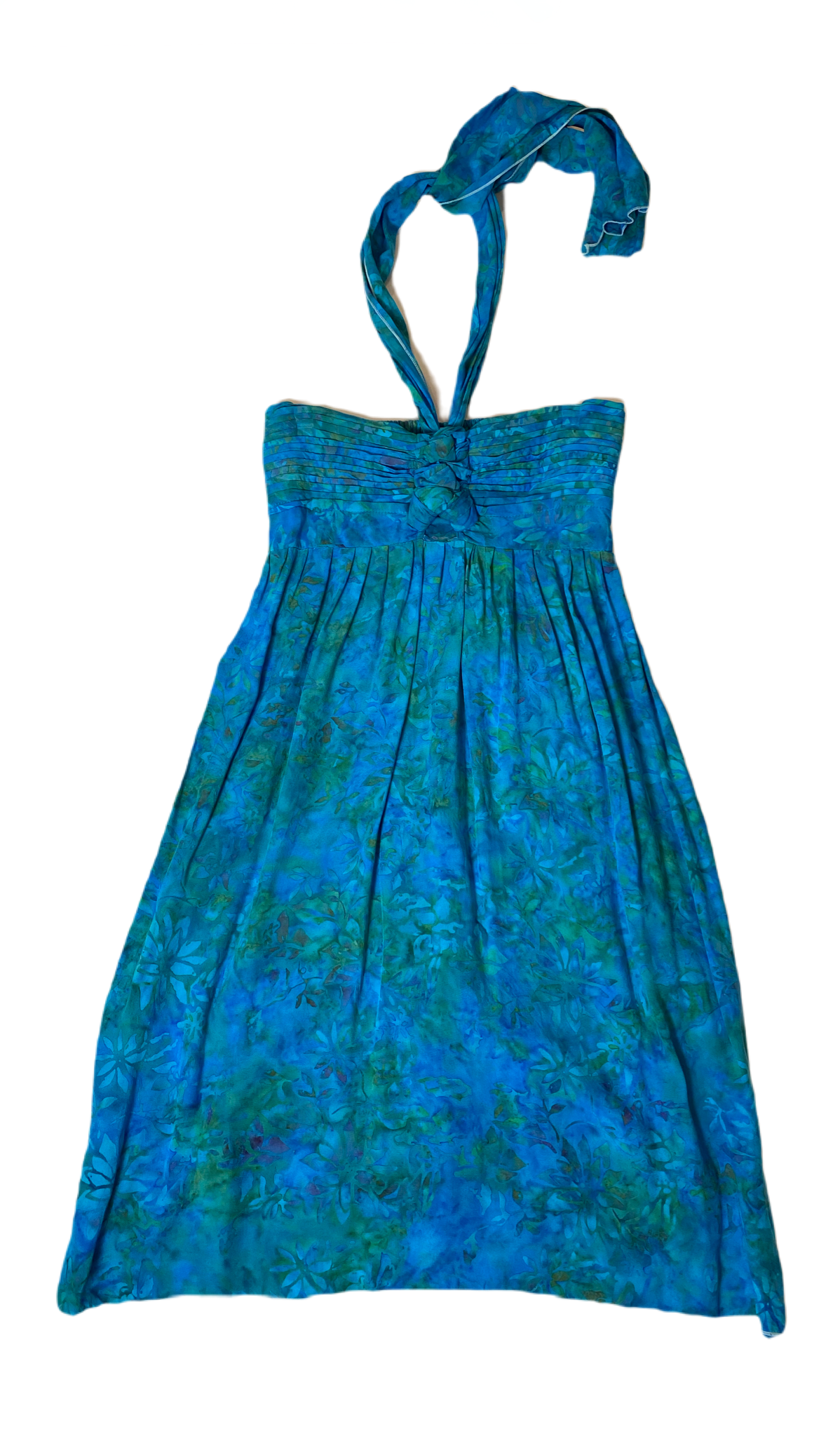 Young Fashion Print Halter DressShort blue and green print halter dress. Knot front and elastic back.
Add sandals and you are ready to go!